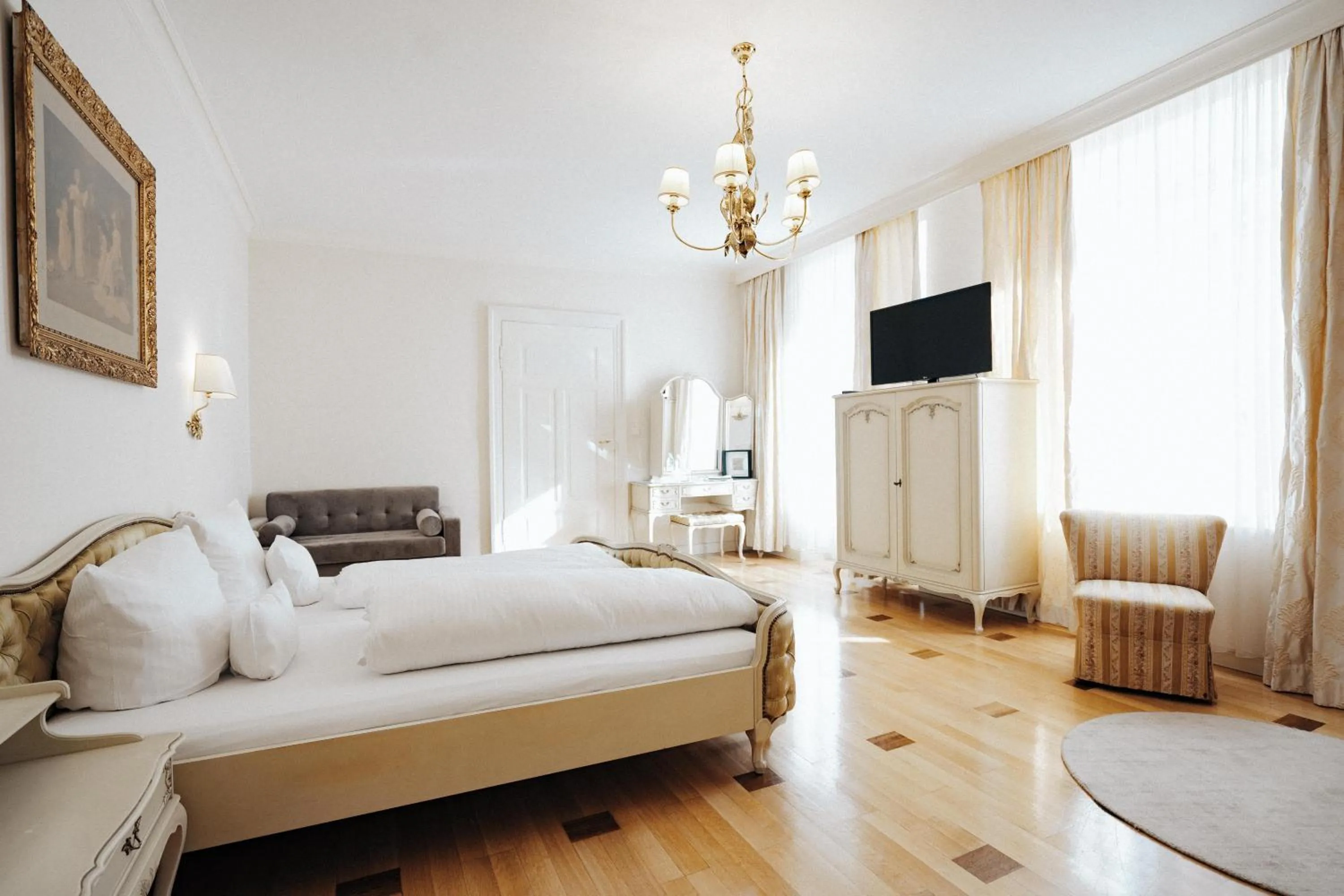 Living room, Bed in Hotel Fletzinger