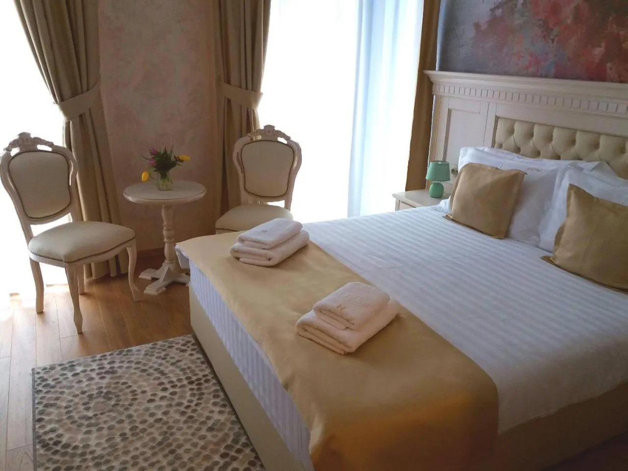 Bed in Park Luxury Rooms