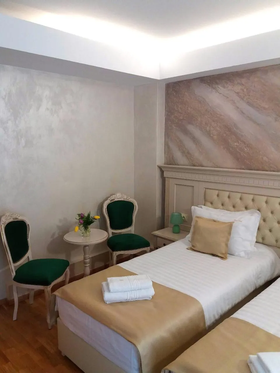 Bed in Park Luxury Rooms