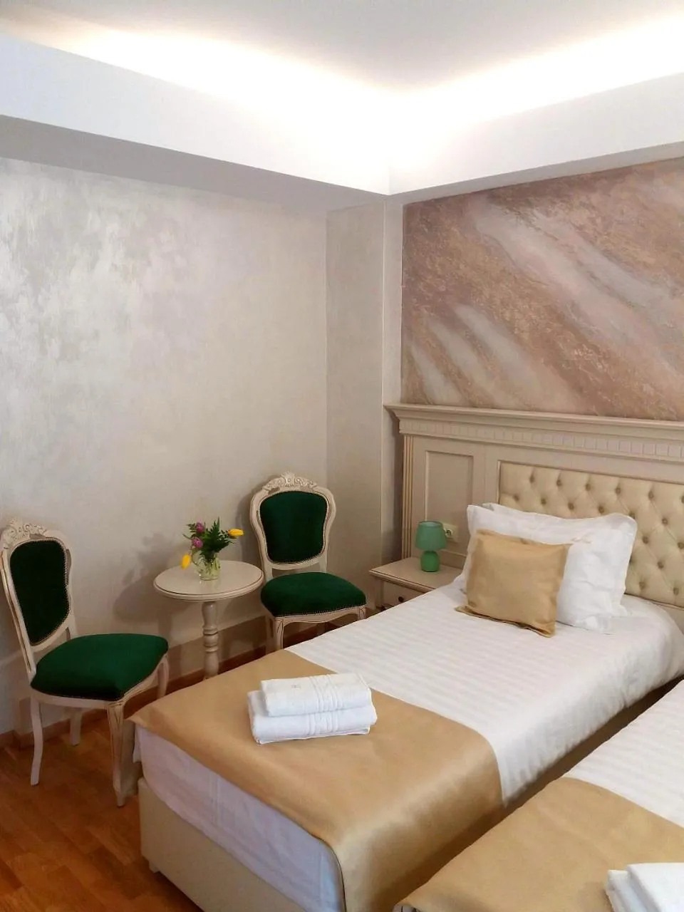 Bed in Park Luxury Rooms