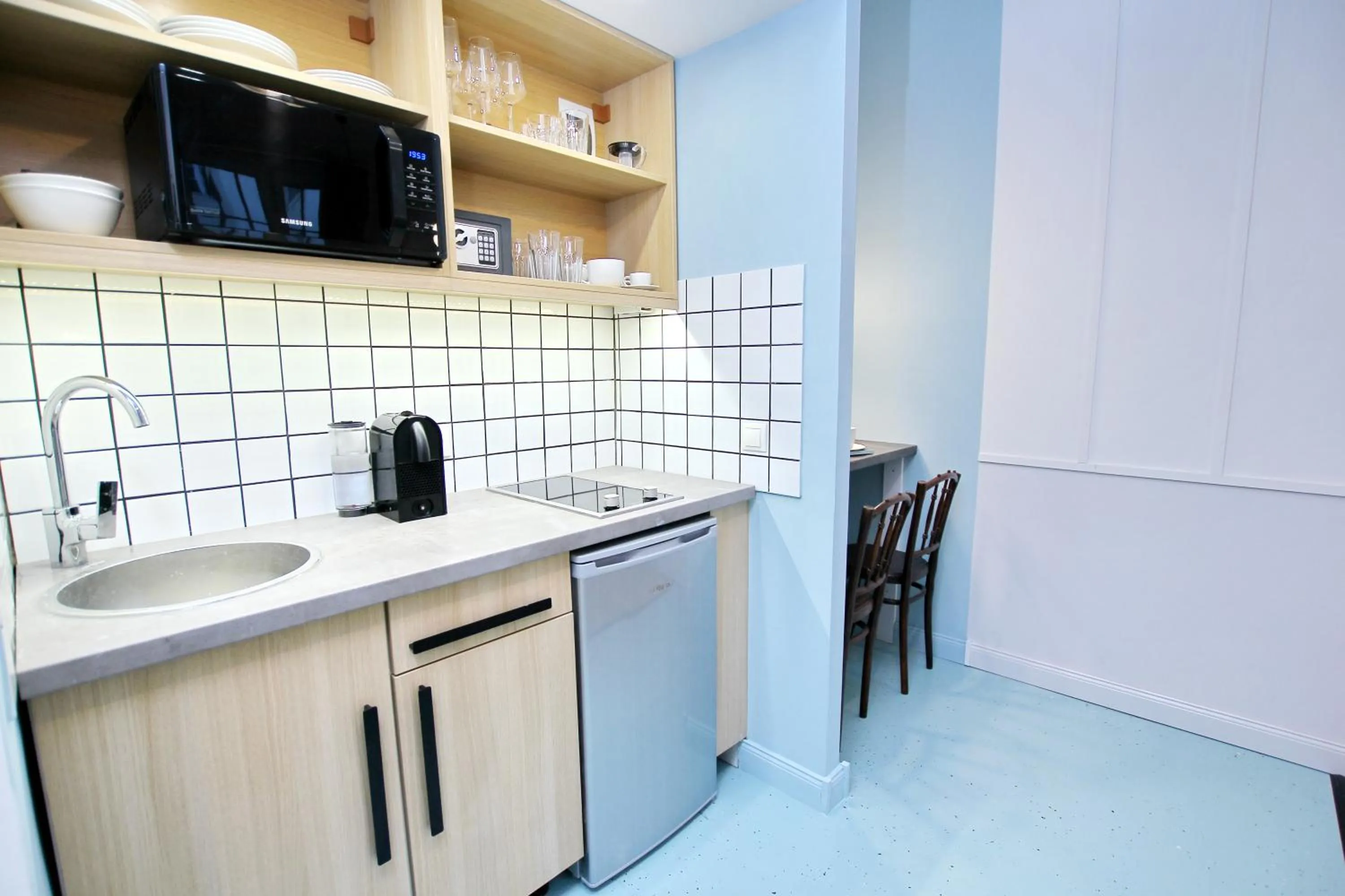 Kitchen or kitchenette in Gellerico Apartments Deák Square