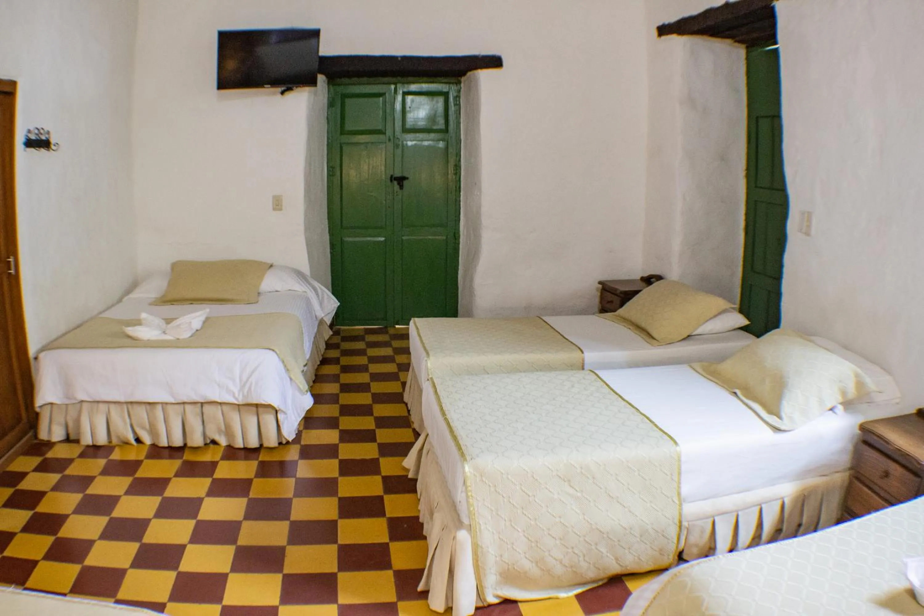 Bed in Casa Hotel Guaracú