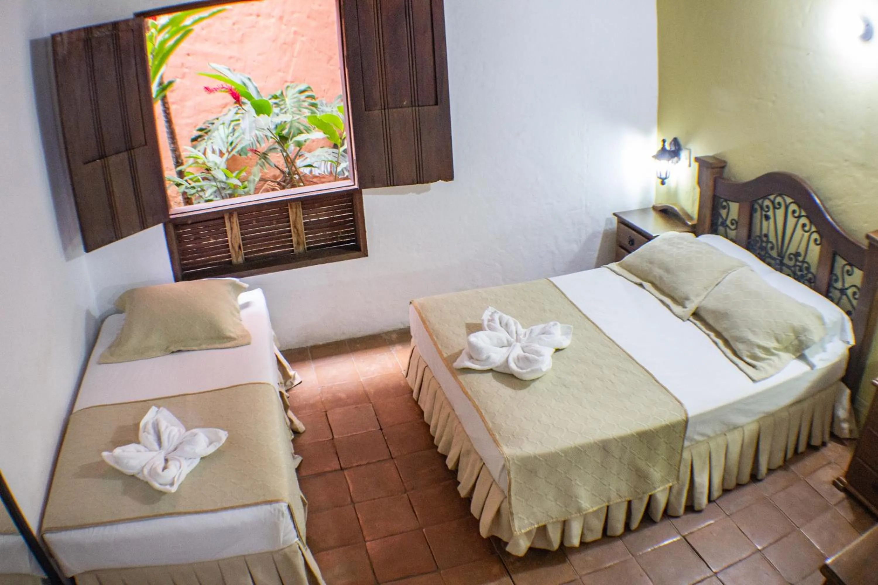 Bed in Casa Hotel Guaracú