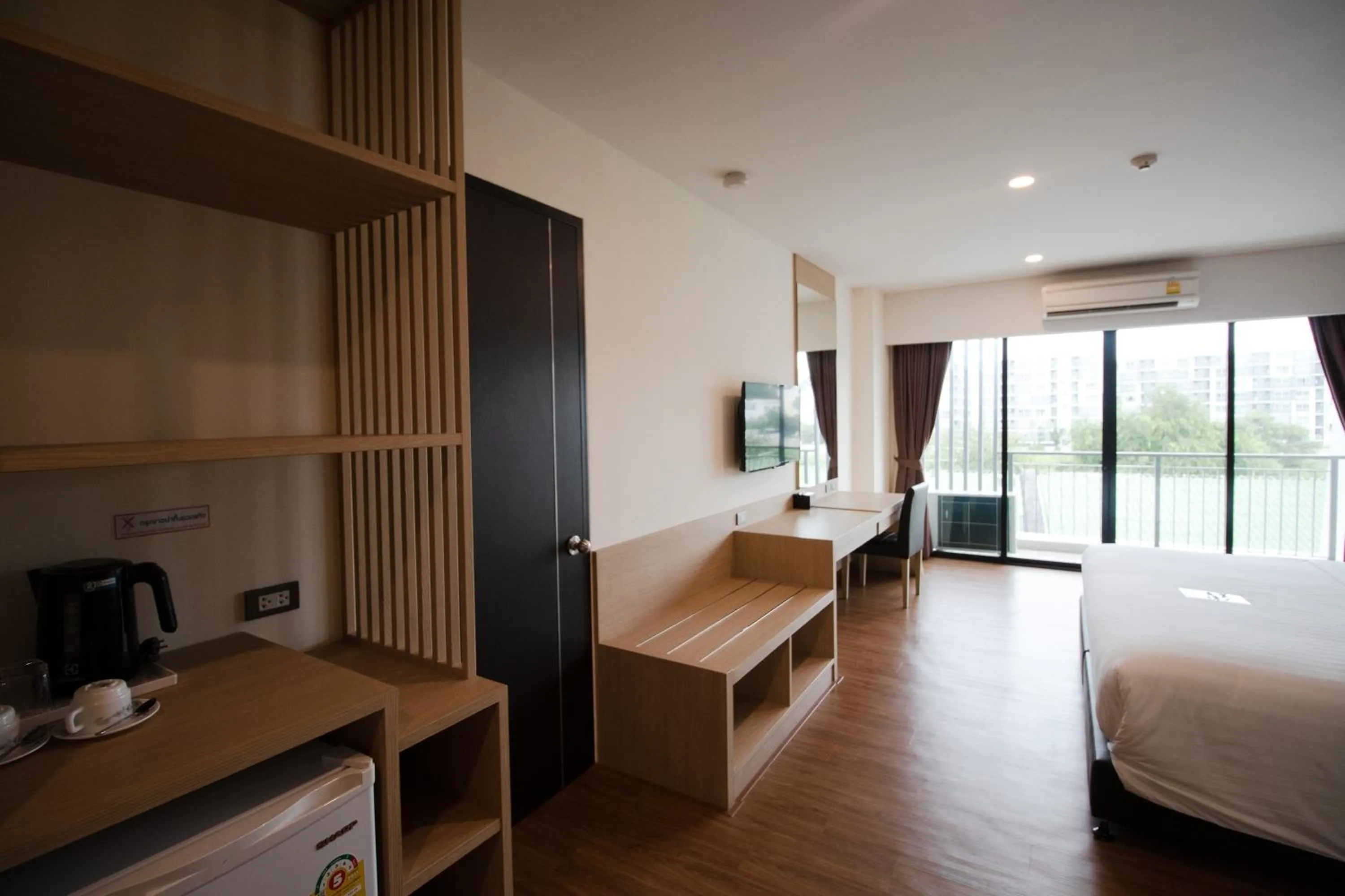 Bed in Phavina Hotel & Grand Boutique Rayong