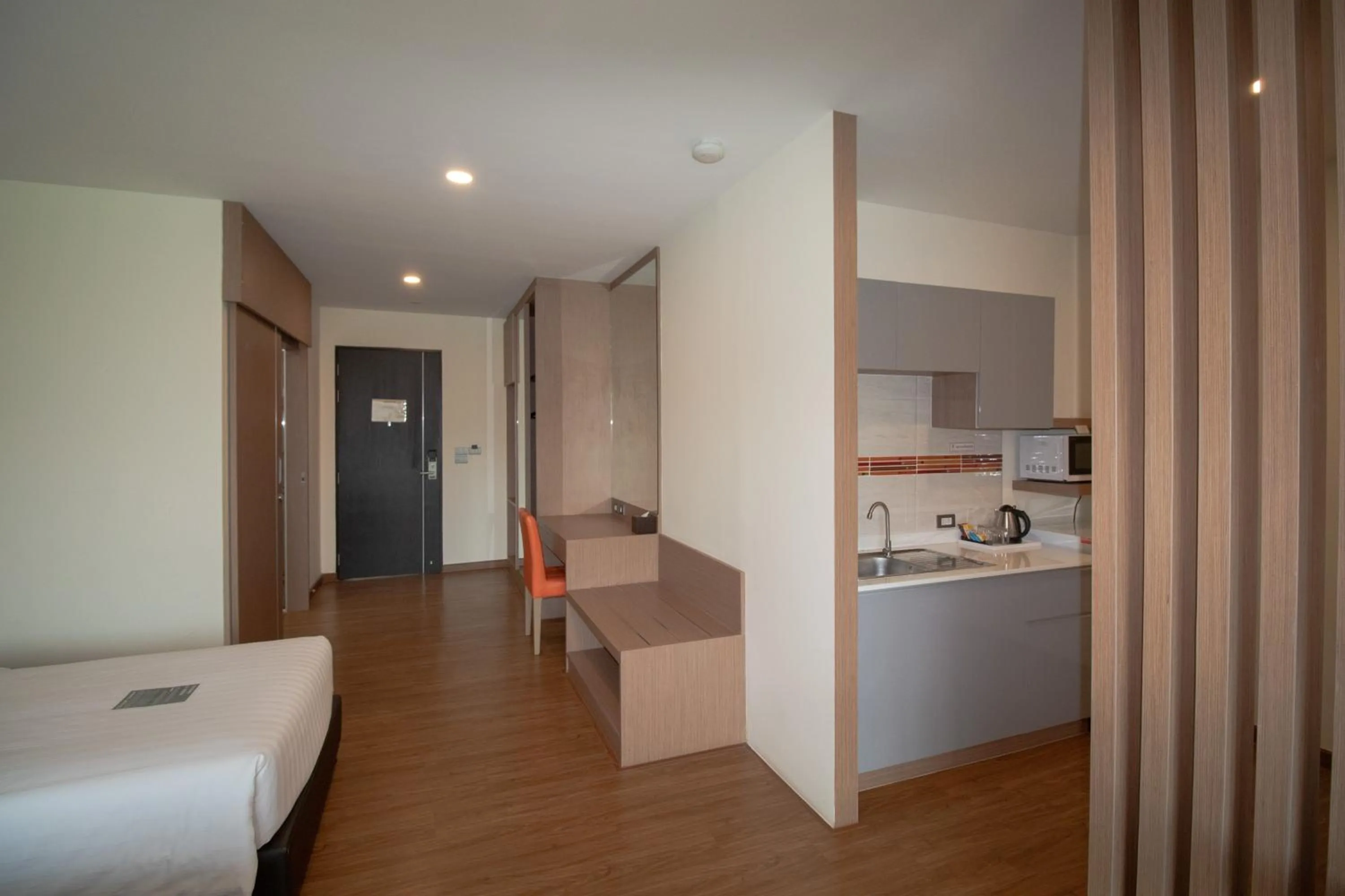 Bed in Phavina Hotel & Grand Boutique Rayong