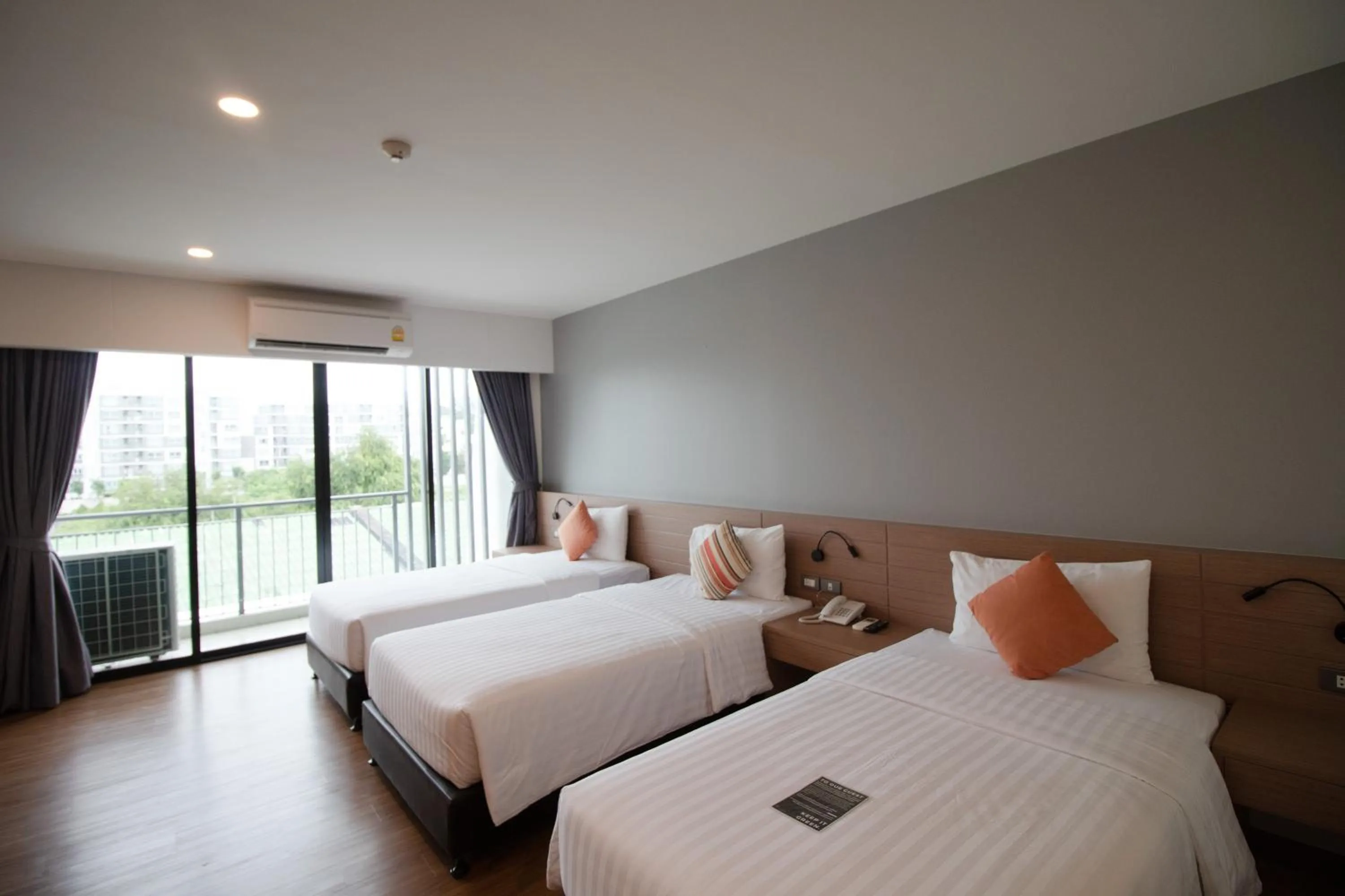 Bed in Phavina Hotel & Grand Boutique Rayong