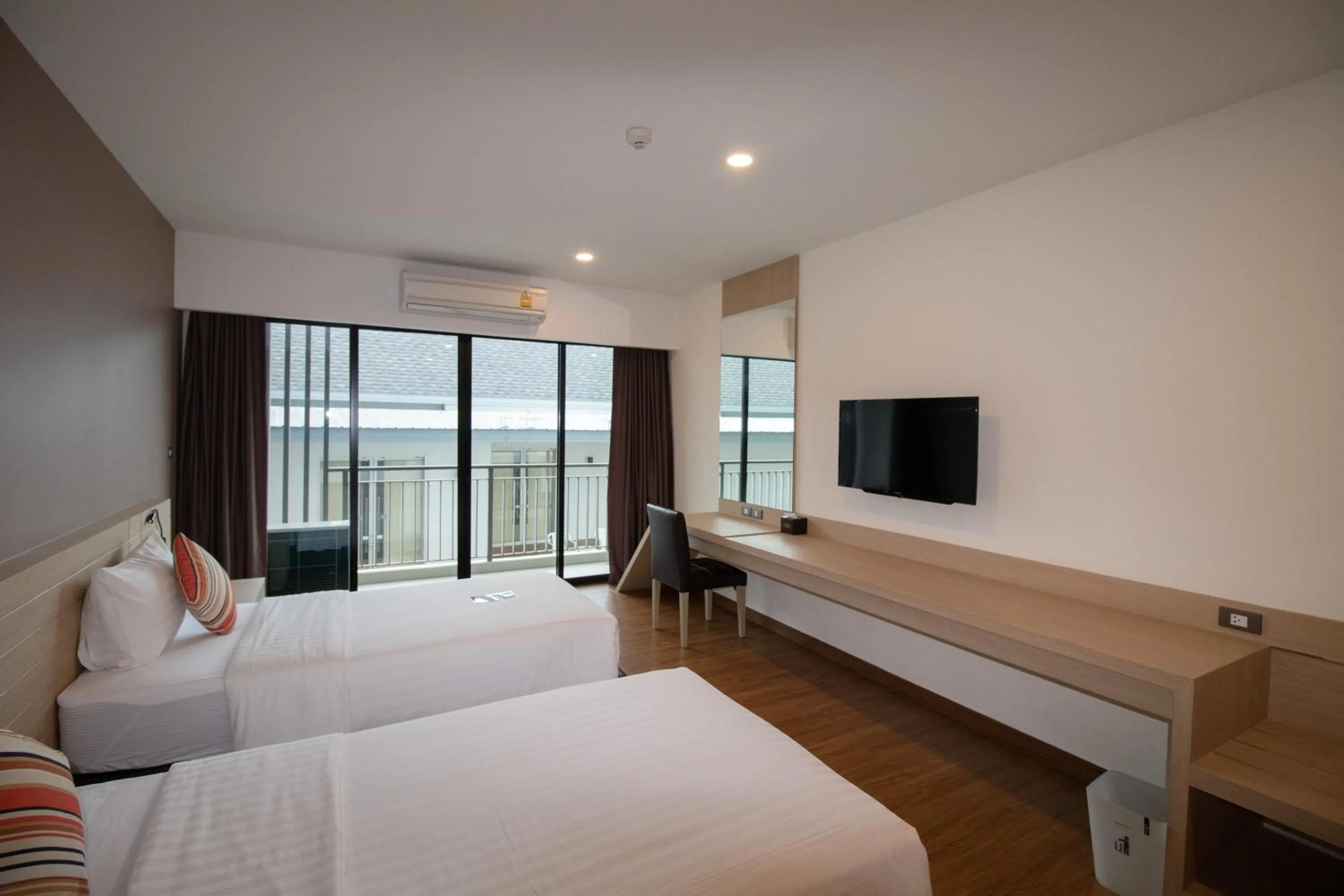Bed in Phavina Hotel & Grand Boutique Rayong