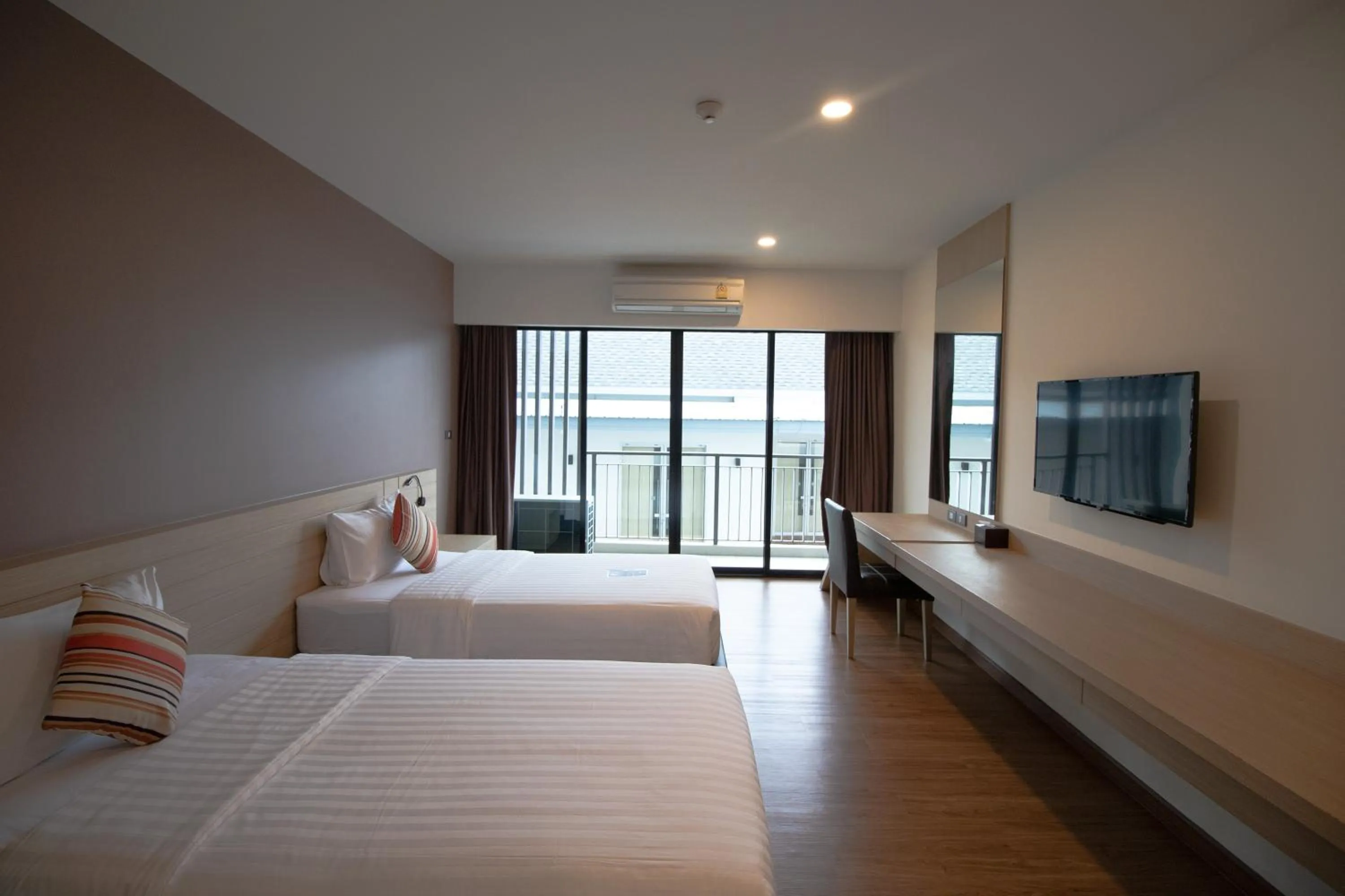 Bed in Phavina Hotel & Grand Boutique Rayong