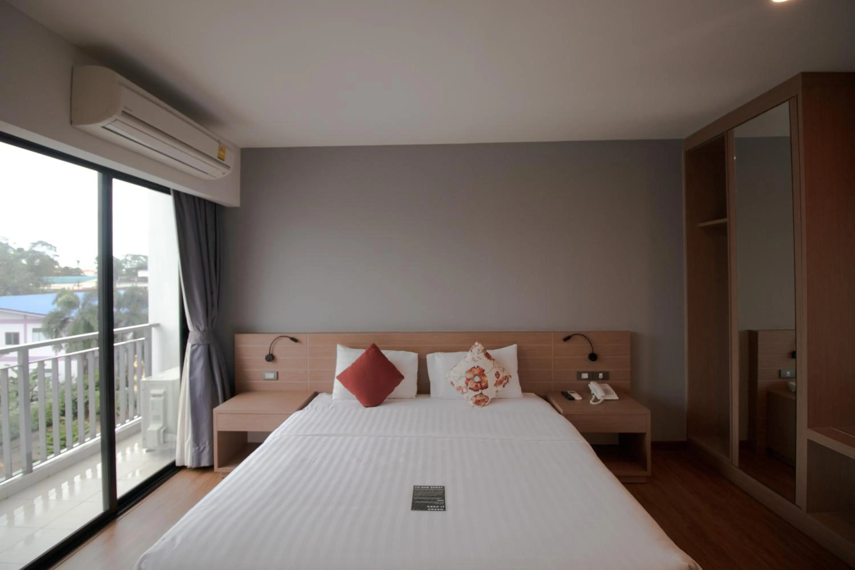 Bed in Phavina Hotel & Grand Boutique Rayong