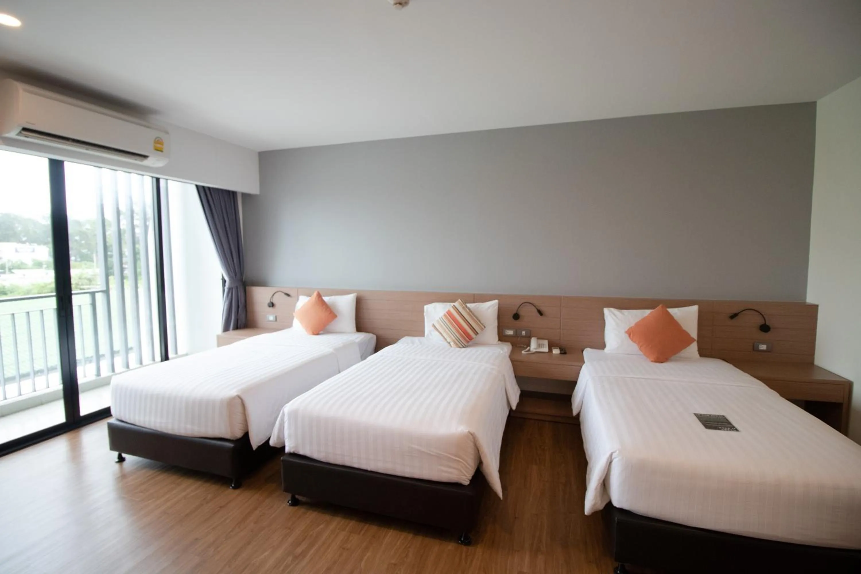 Bed in Phavina Hotel & Grand Boutique Rayong
