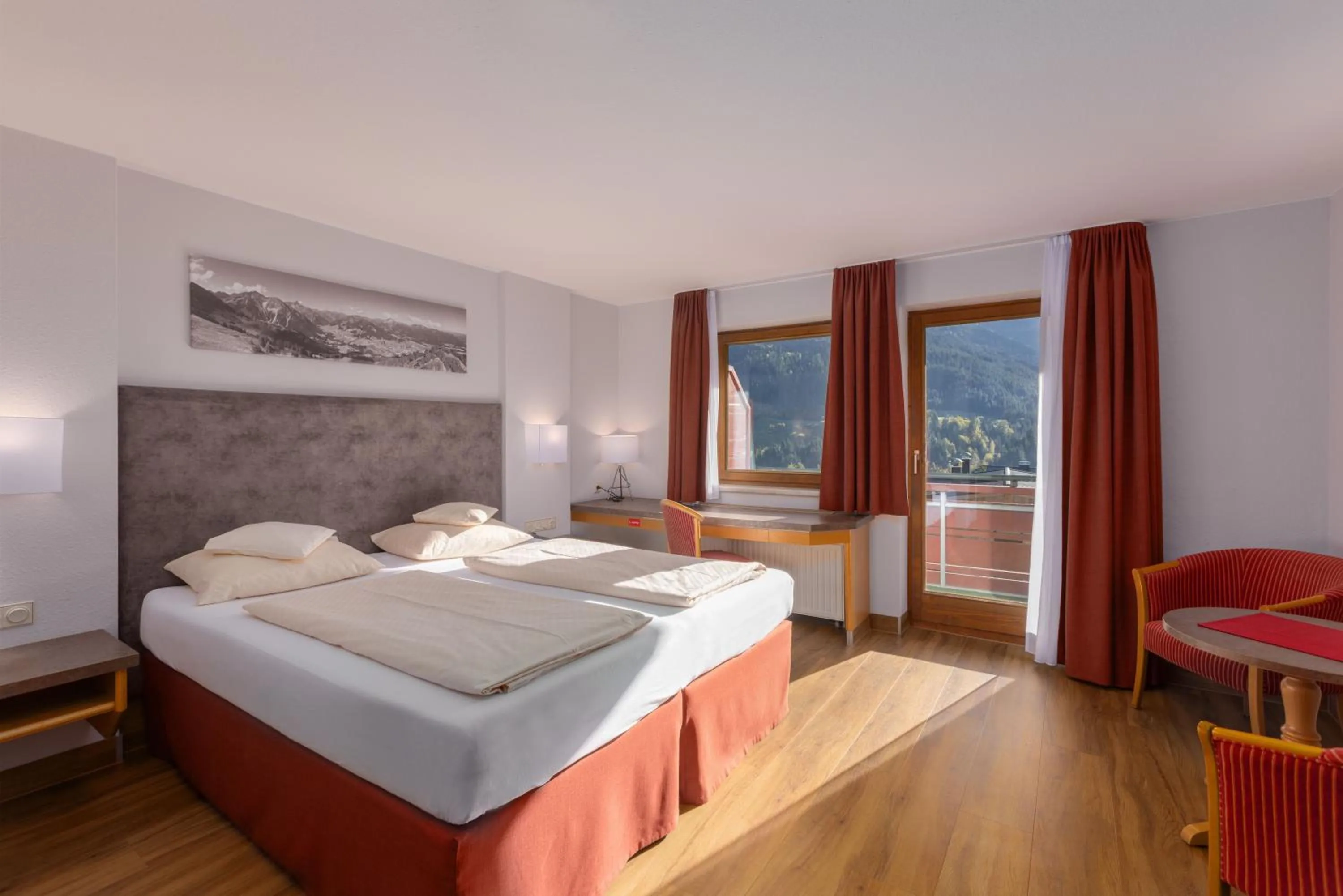 Photo of the whole room, Bed in IFA Alpenrose Hotel Kleinwalsertal