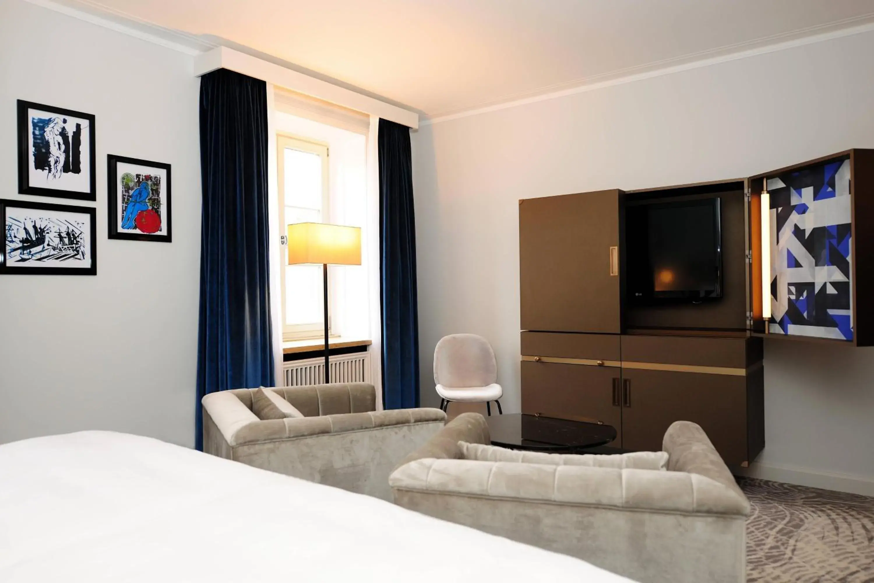 Photo of the whole room, Bed in Hotel Elephant Weimar, Autograph Collection Photo of the whole room, Bed in Hotel Elephant Weimar, Autograph Collection