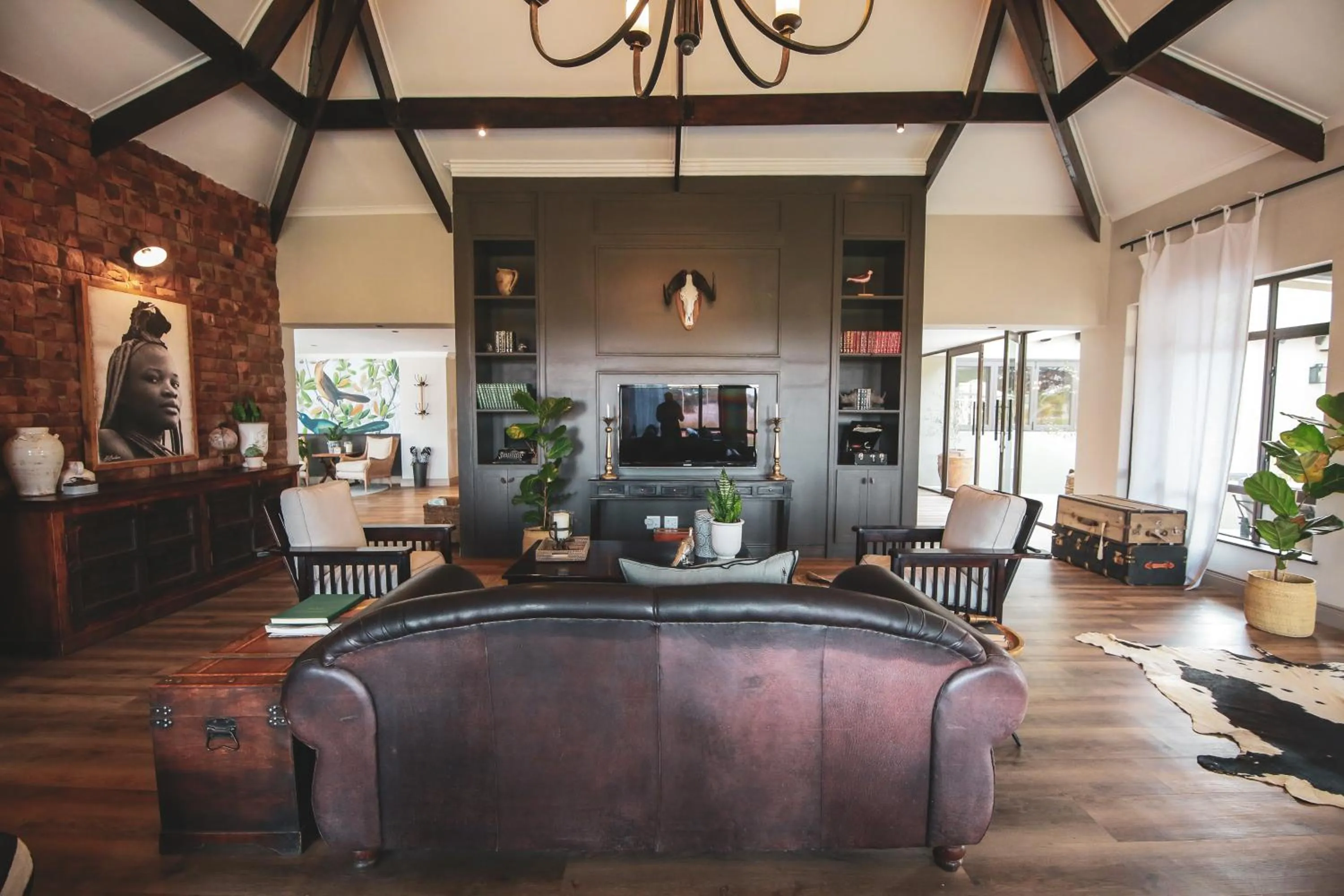 Communal lounge/ TV room in Otjiwa Safari Lodge