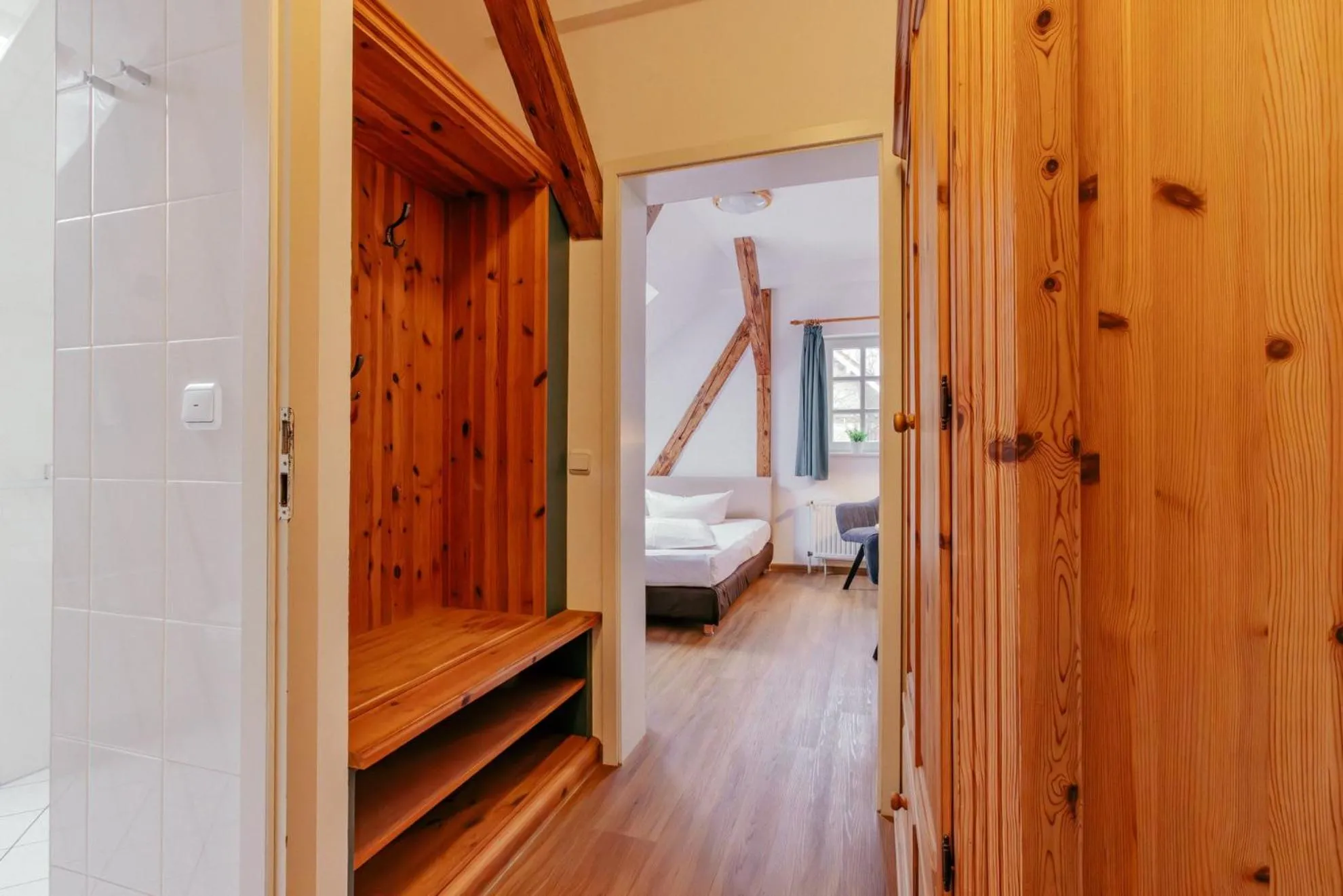 Photo of the whole room, Bed in Hotel Schlösschen Sundische Wiese Zingst