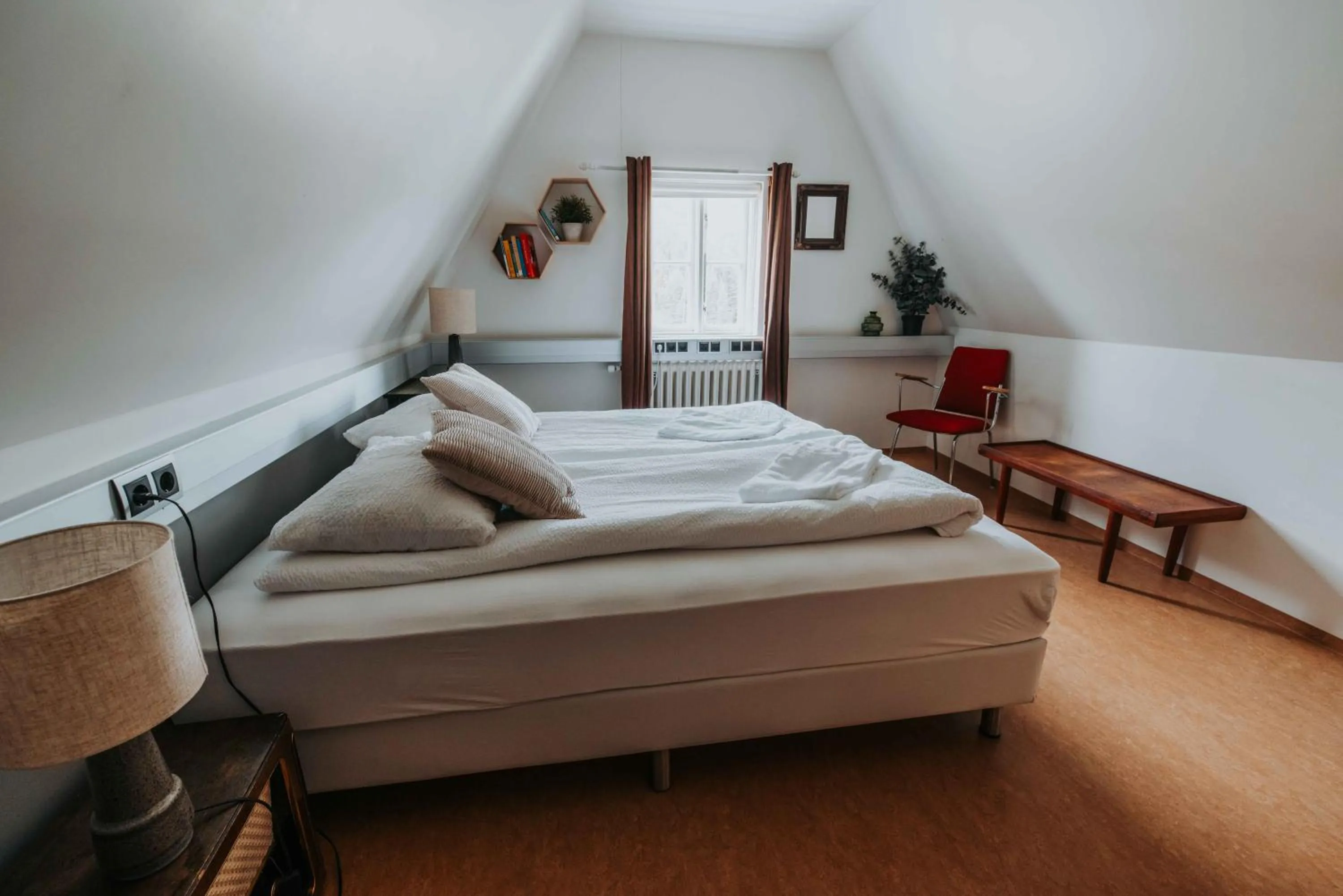 Bed in Héradsskólinn Historic Guesthouse