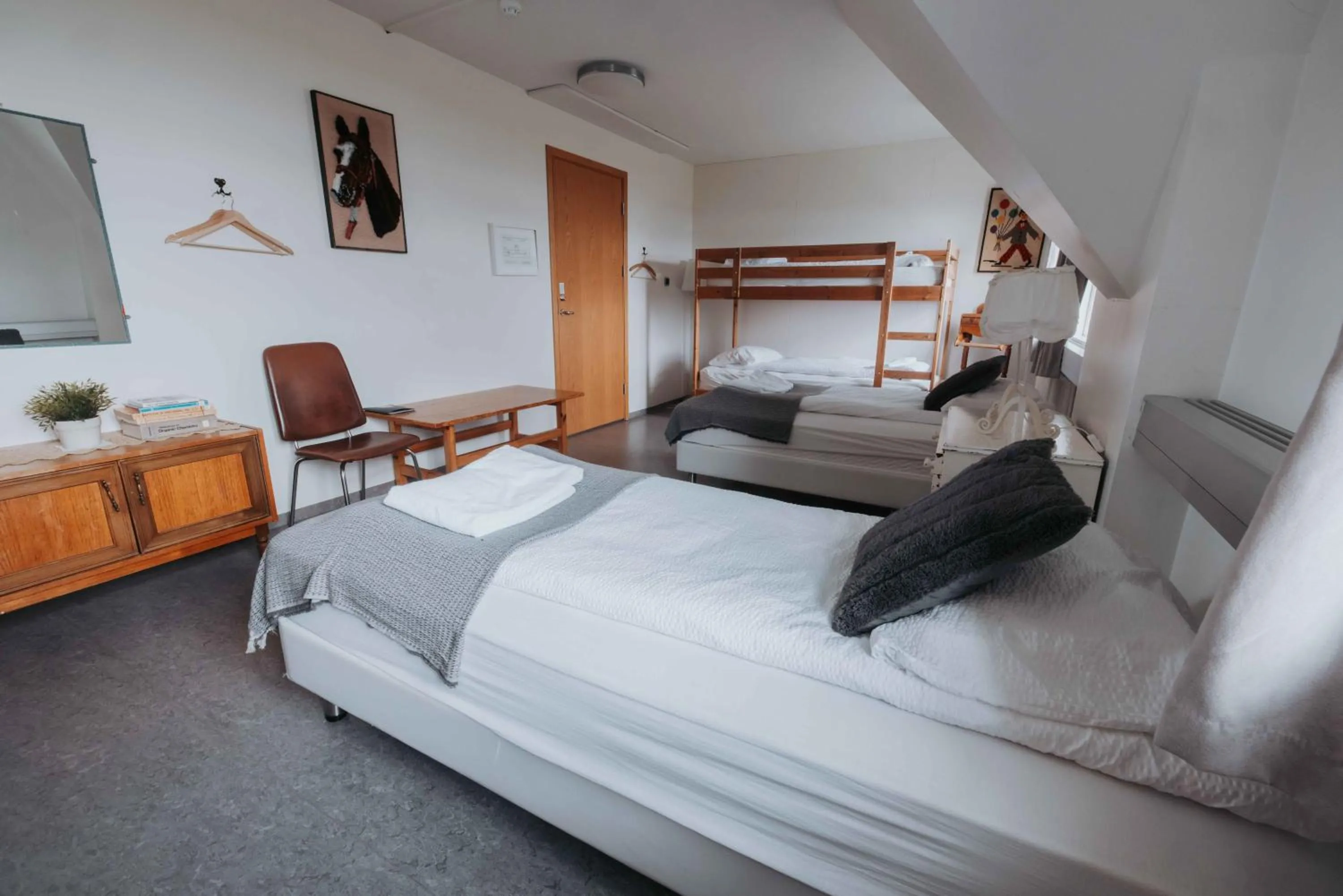 Bed in Héradsskólinn Historic Guesthouse