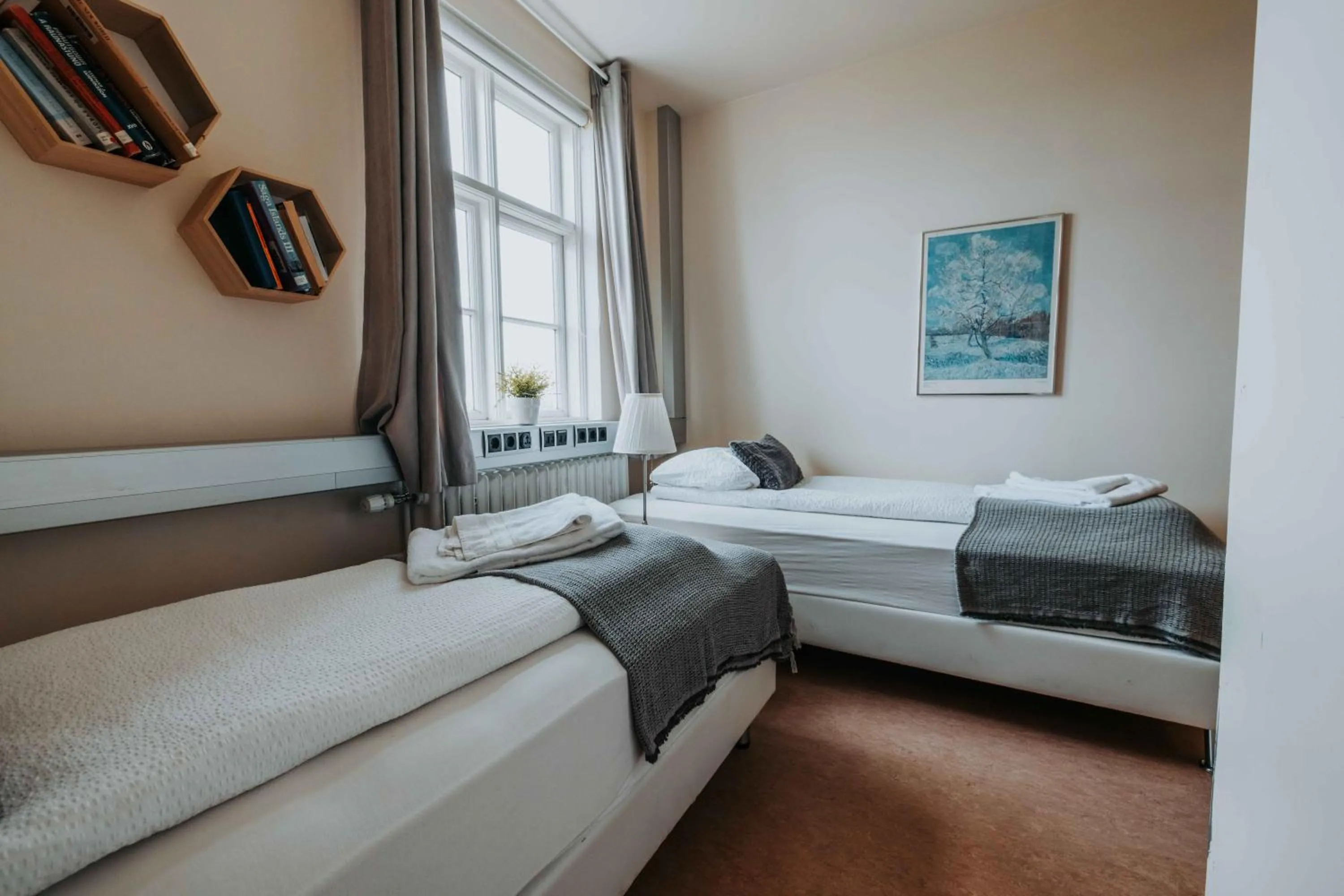 Bed in Héradsskólinn Historic Guesthouse