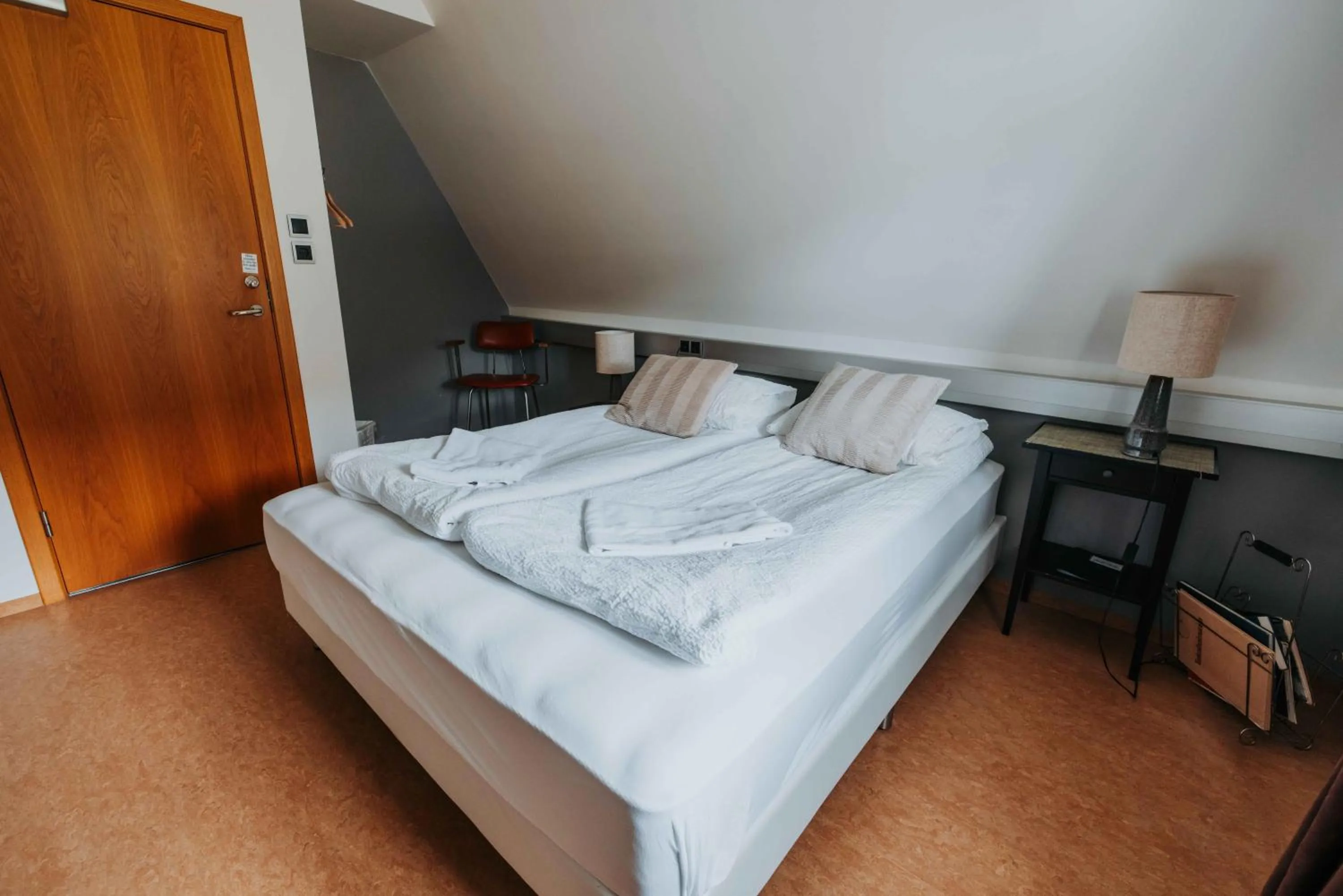 Bed in Héradsskólinn Historic Guesthouse