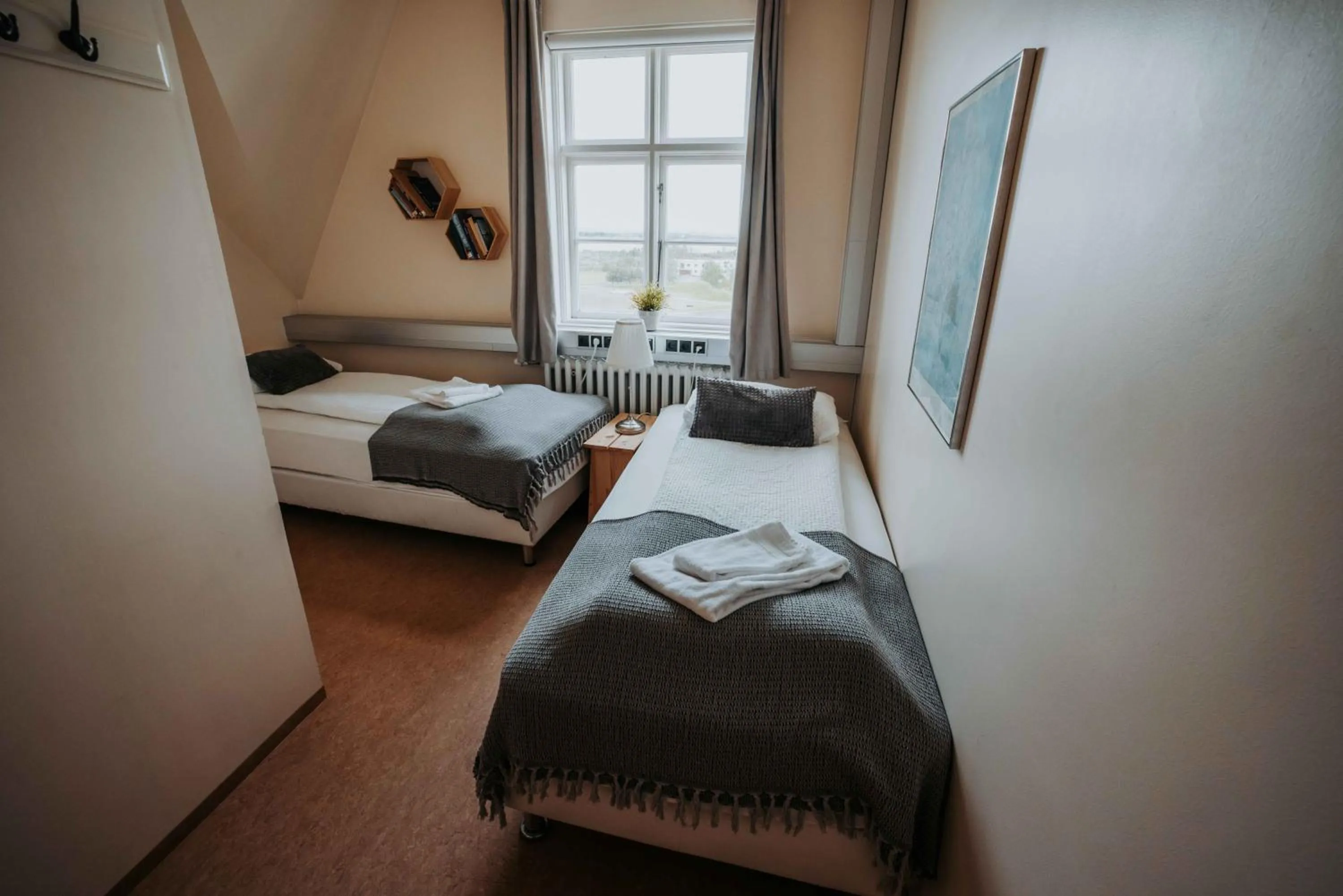 Bed in Héradsskólinn Historic Guesthouse