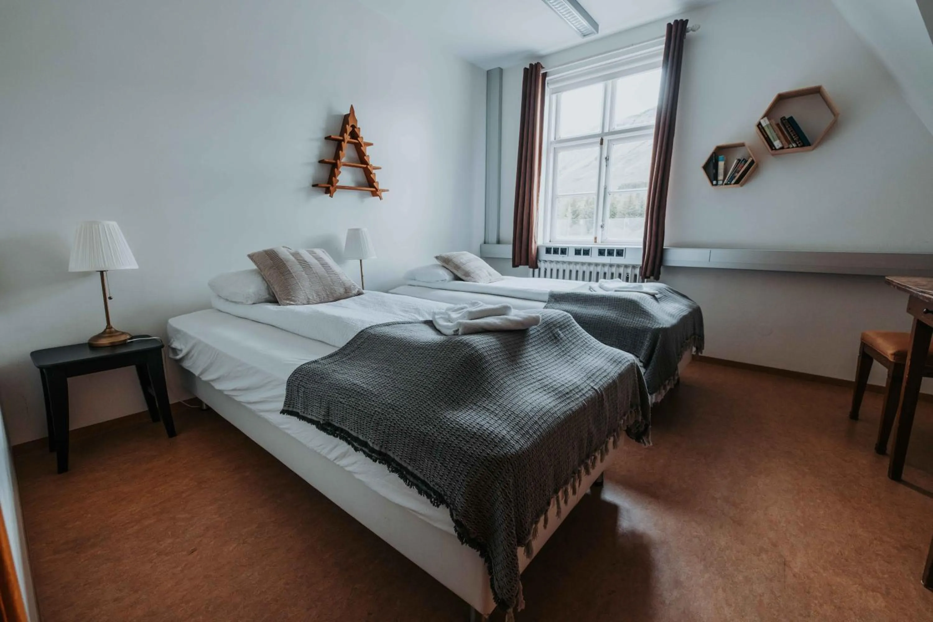 Bed in Héradsskólinn Historic Guesthouse