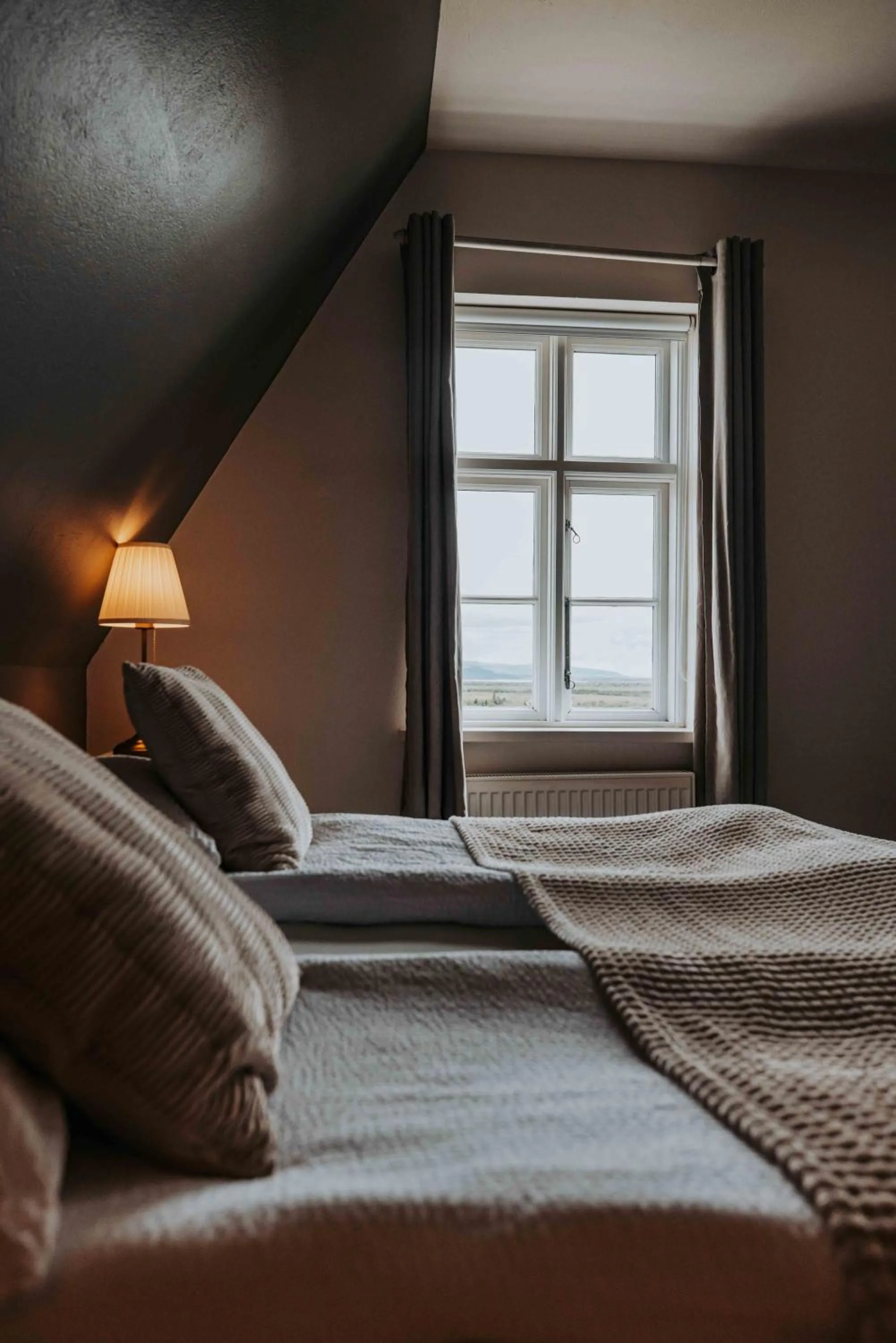 Bed in Héradsskólinn Historic Guesthouse