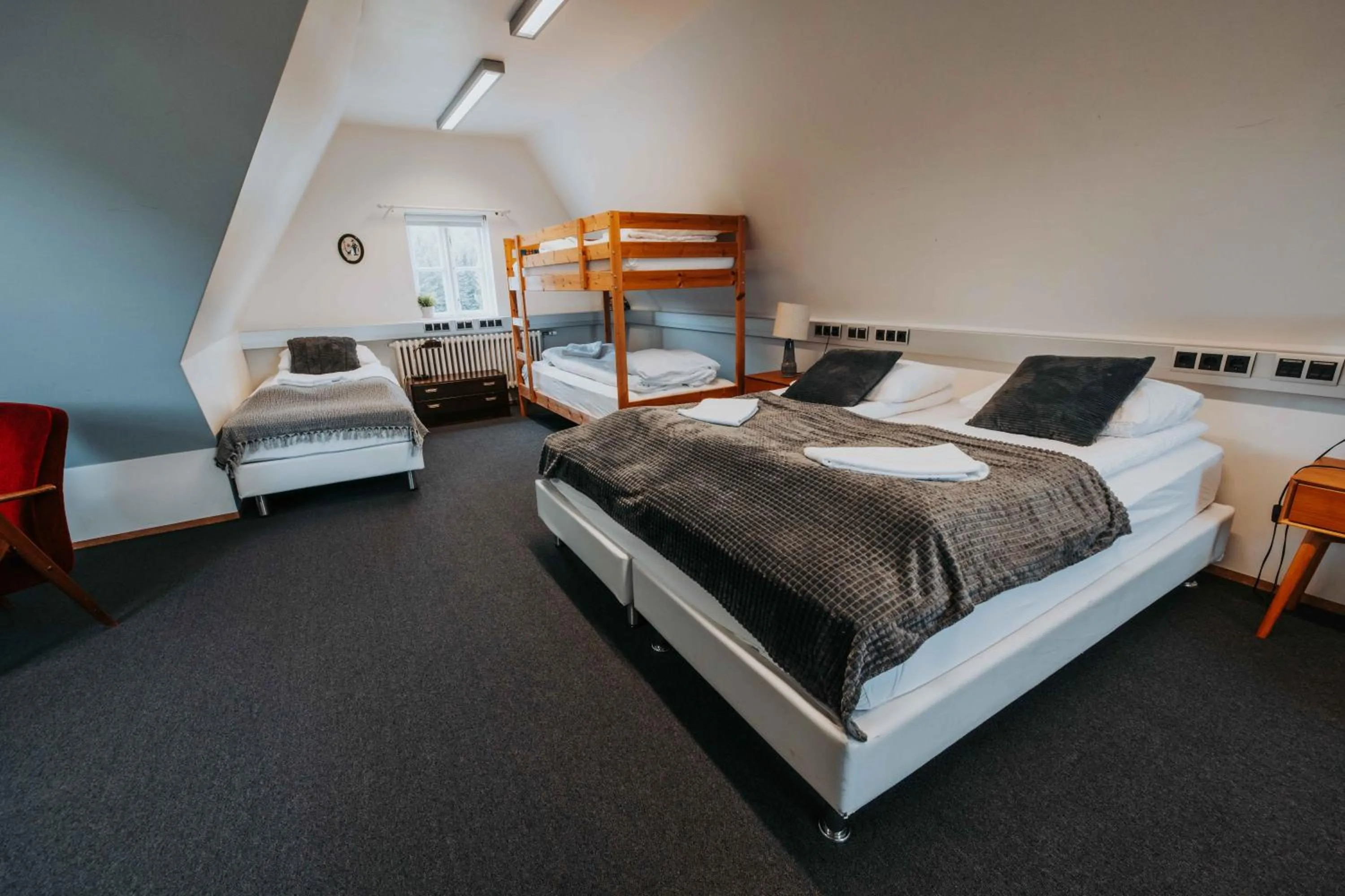 Bed in Héradsskólinn Historic Guesthouse