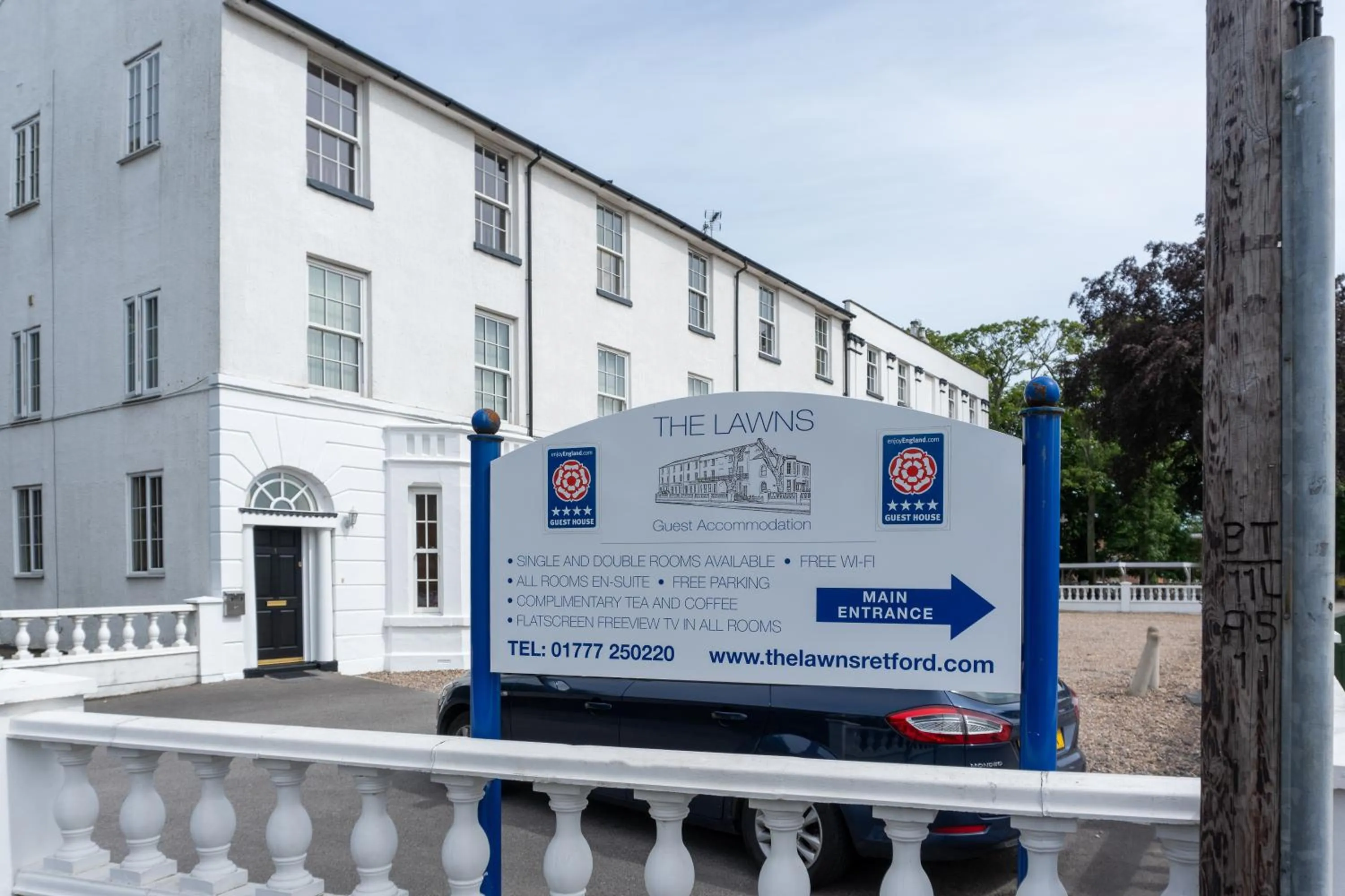 Property logo or sign in The Lawns Guest House