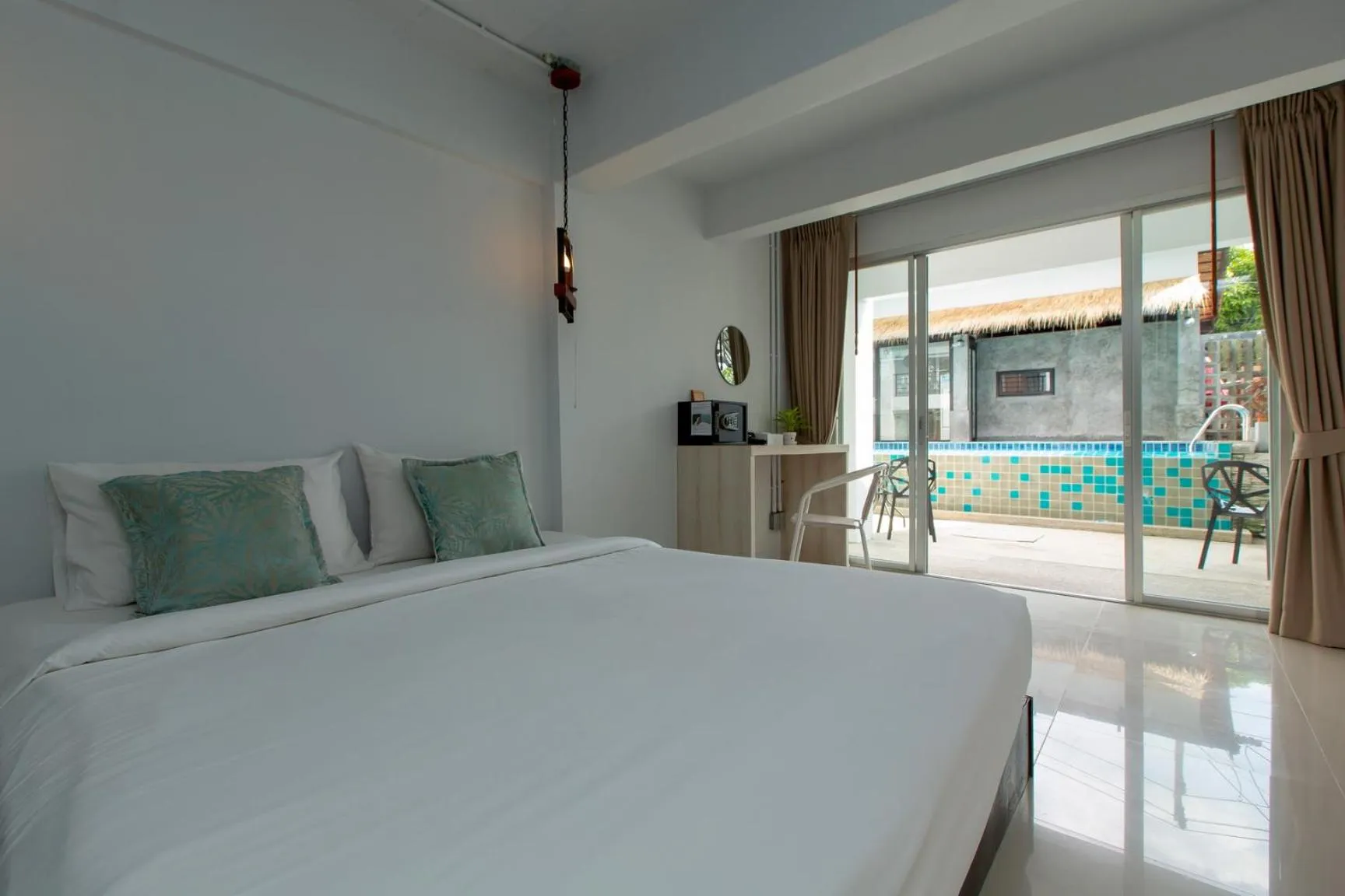 Balcony/Terrace, Bed in The Nest Resort Patong
