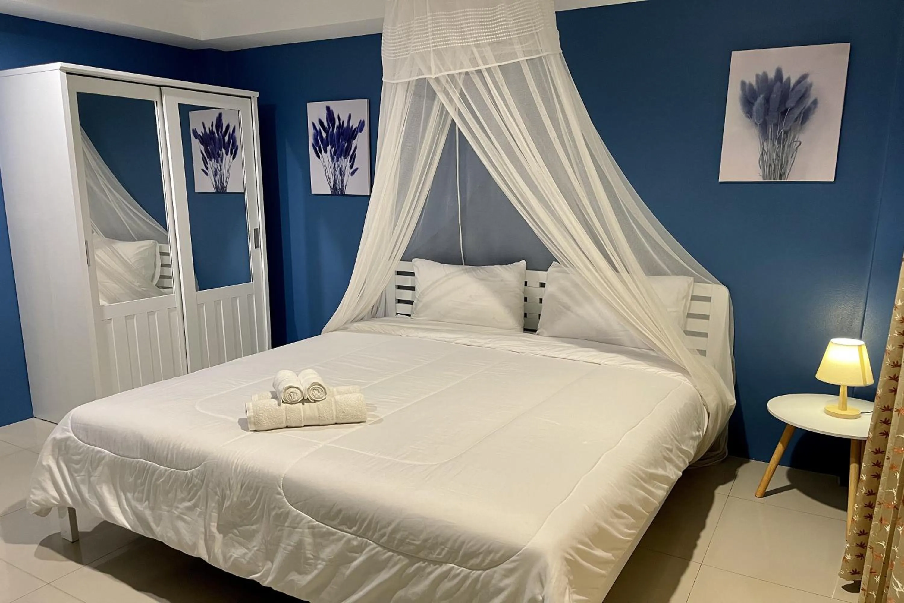 Bed in Be Rich Hotel