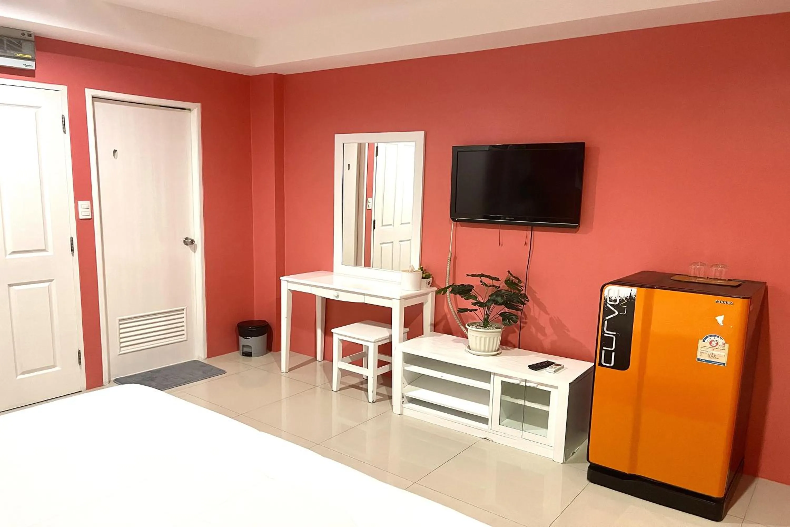 Bed in Be Rich Hotel