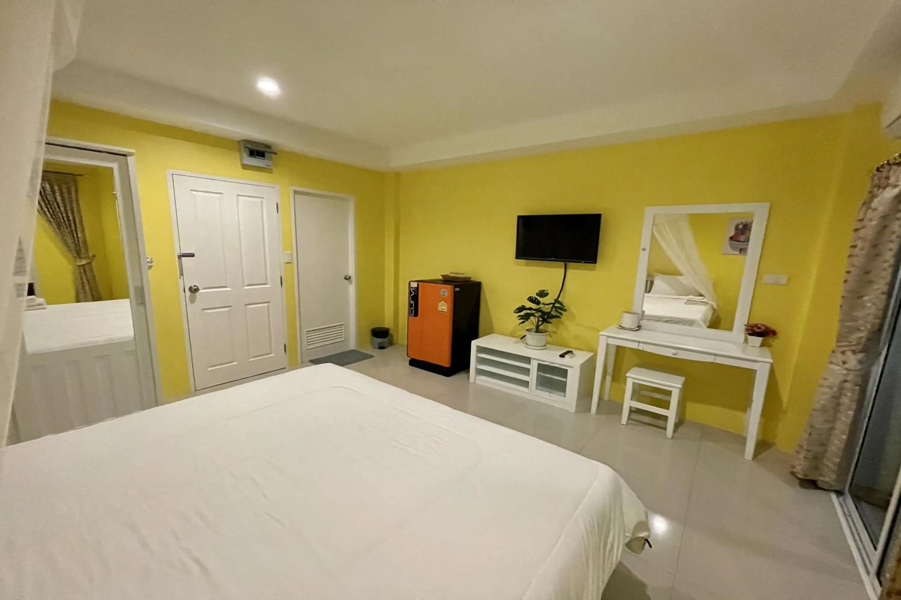 Bed in Be Rich Hotel