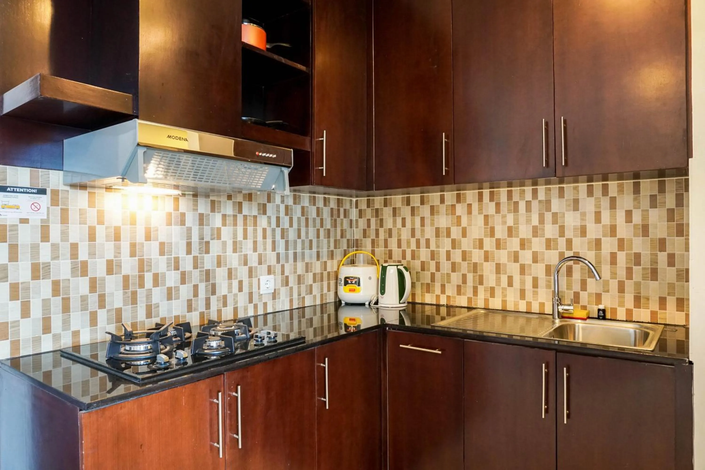 Cozy 2BR at Empyreal Epicentrum Apartment By Travelio