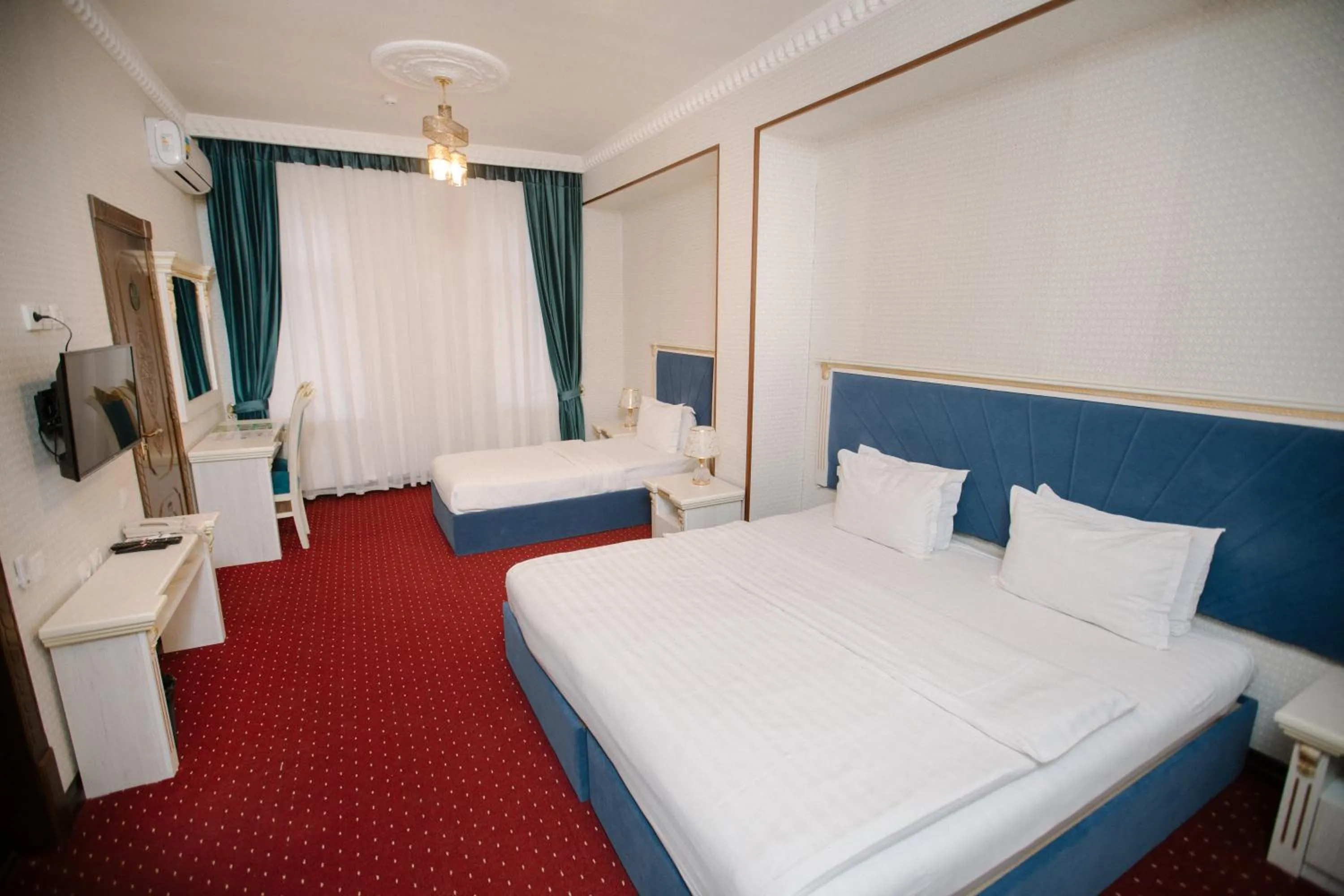 Photo of the whole room, Bed in Dendi Plaza Hotel