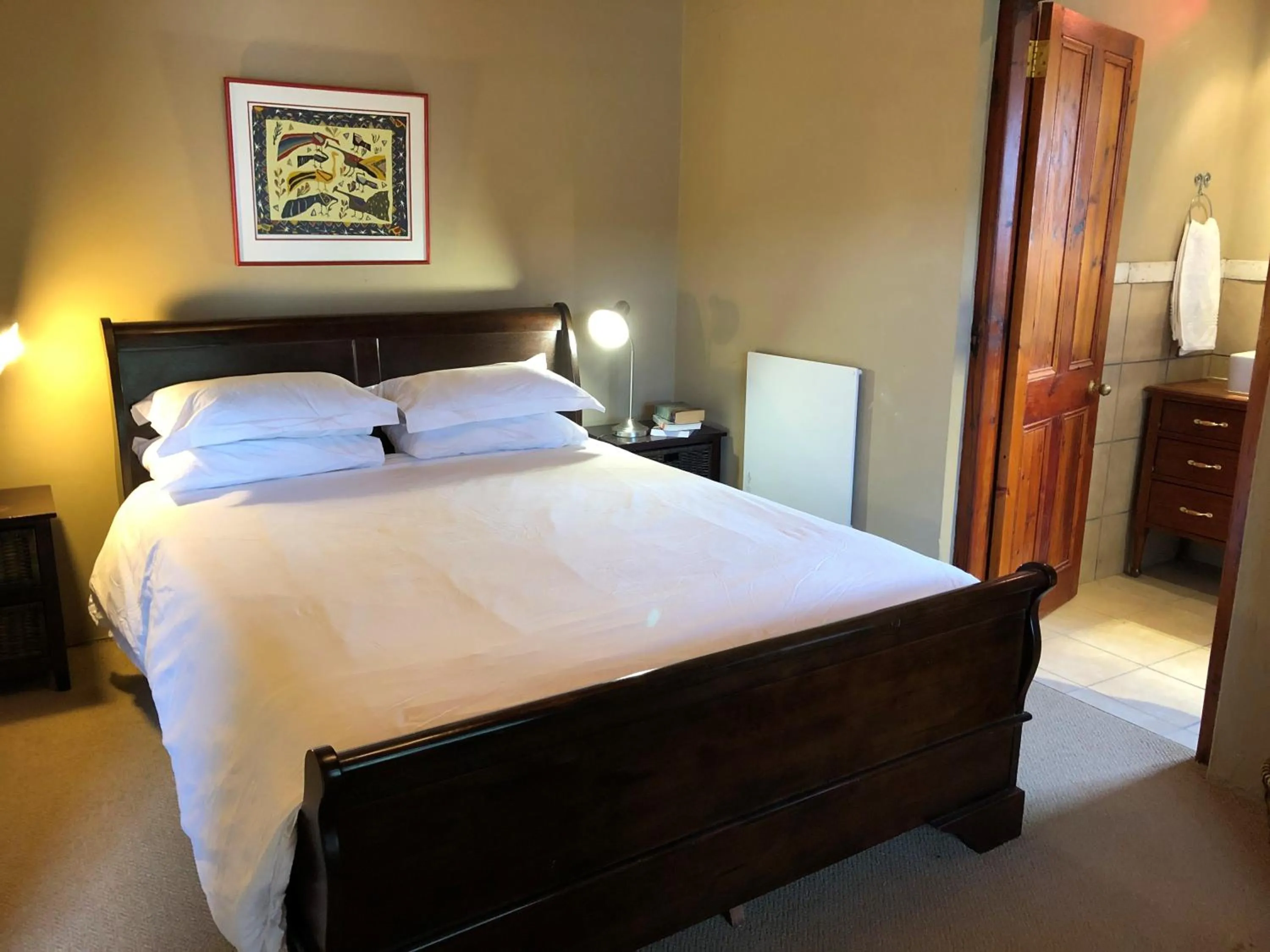 Photo of the whole room, Bed in Celebratio Pomegranate Farm
