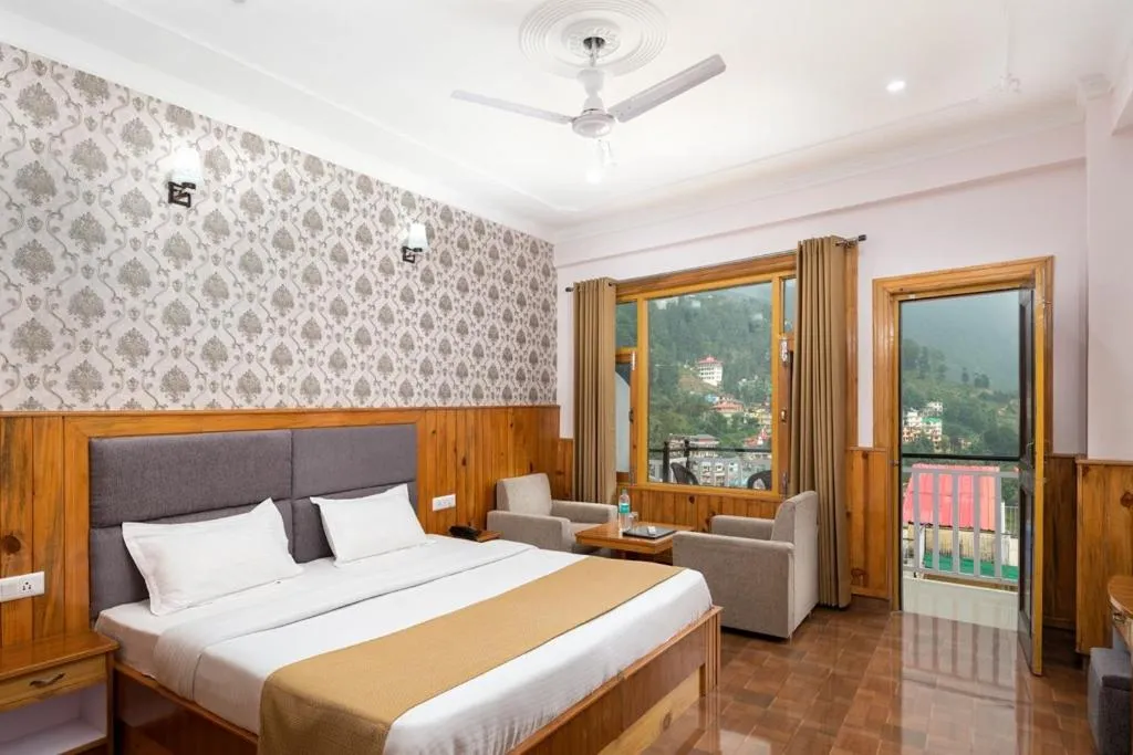 Bed in McLeod Ganj Mountain view