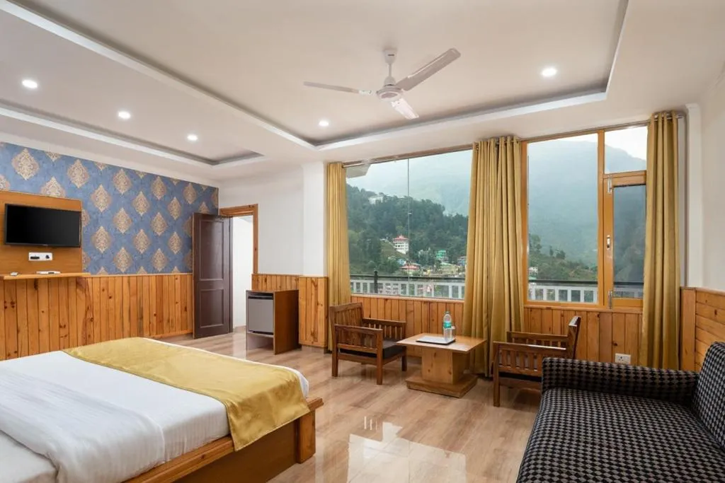 Bed in McLeod Ganj Mountain view