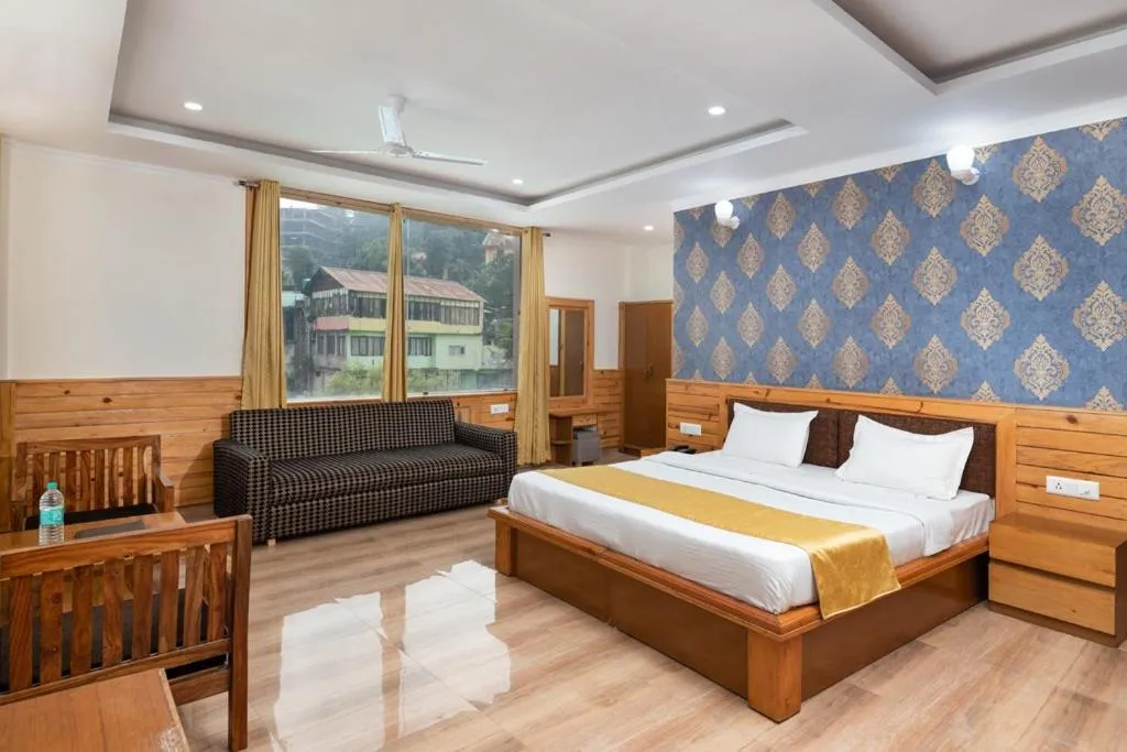 Bed in McLeod Ganj Mountain view