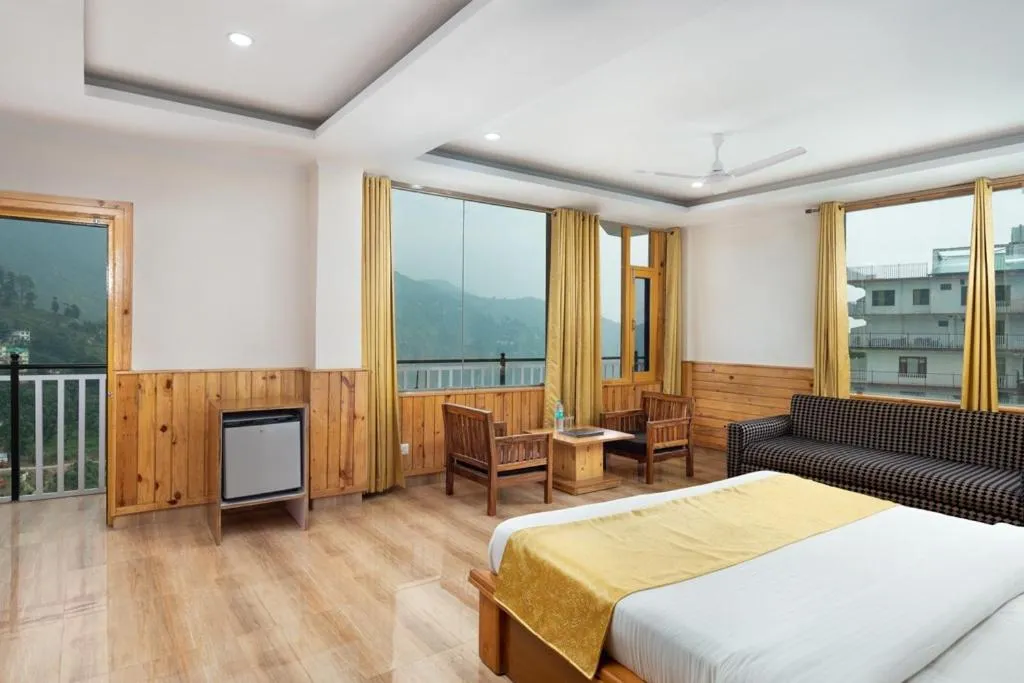 Bed in McLeod Ganj Mountain view