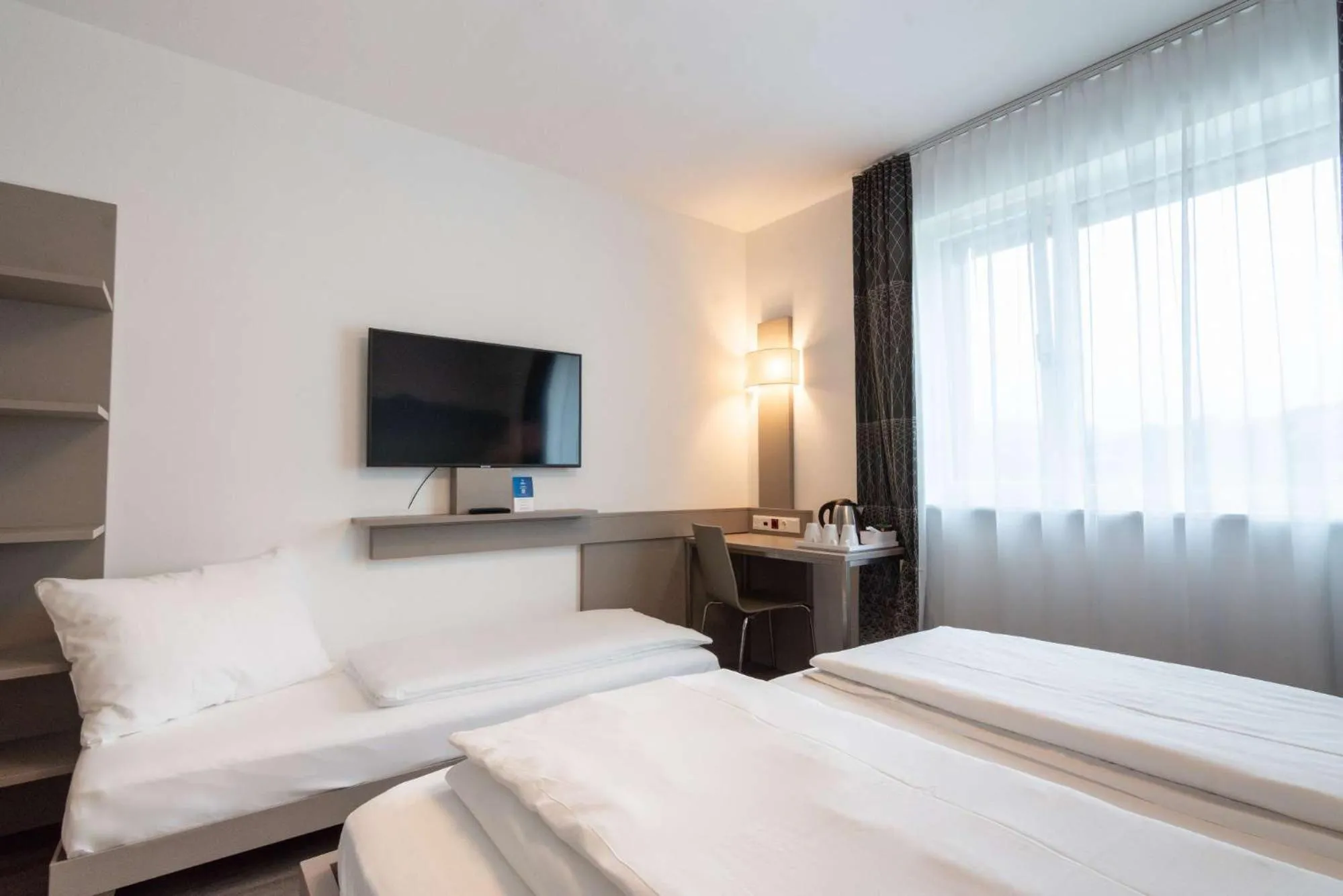 Photo of the whole room, Bed in Best Western Hotel Kiefersfelden