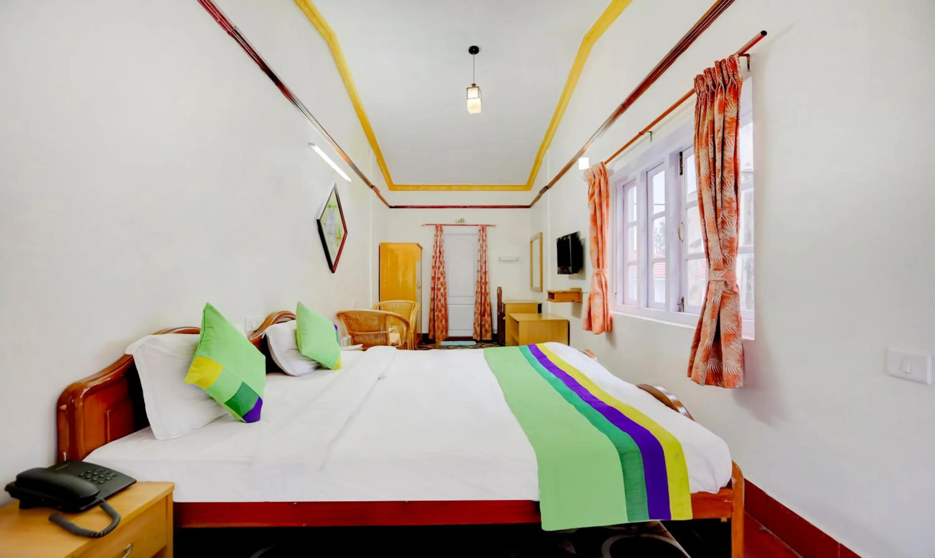 Bedroom, Bed in Treebo Atithi Bhavan, 1 Km From Ooty Lake