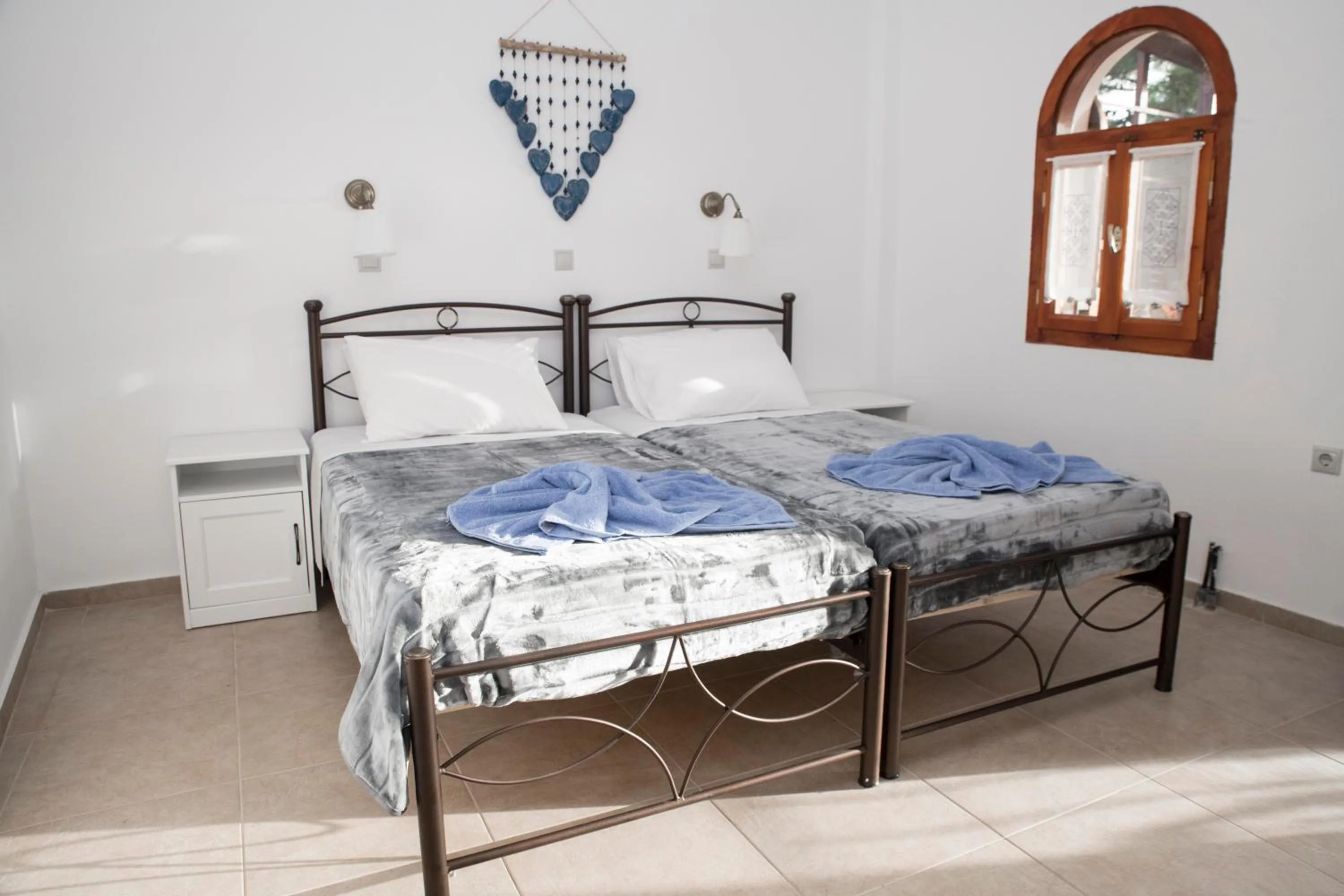 Bed in Bella Vita Style rooms & apartments