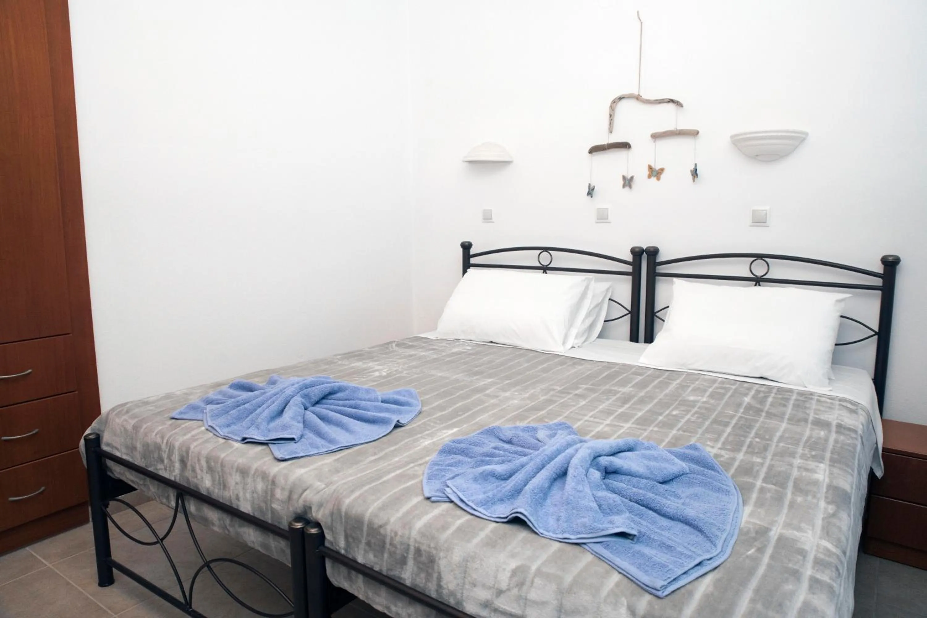 Bed in Bella Vita Style rooms & apartments