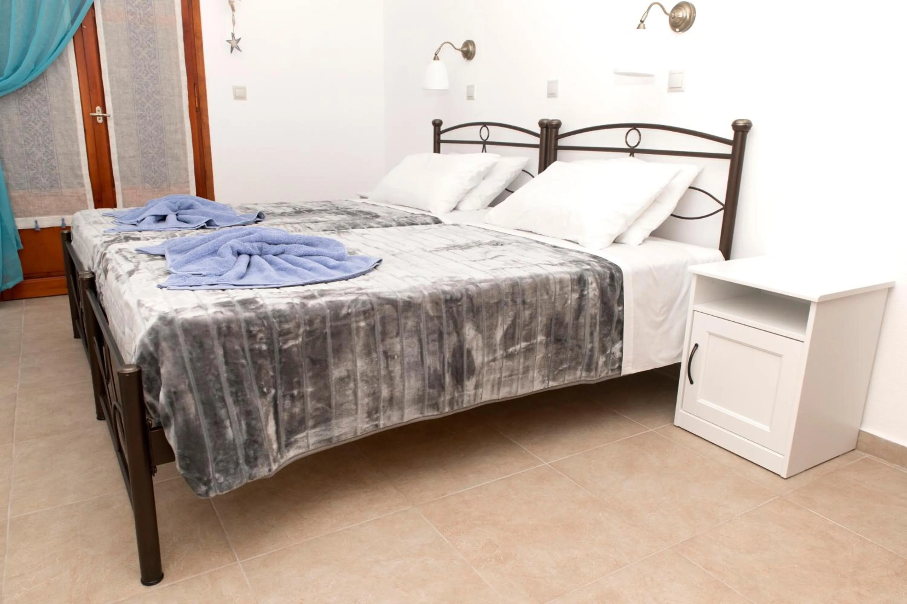 Bed in Bella Vita Style rooms & apartments