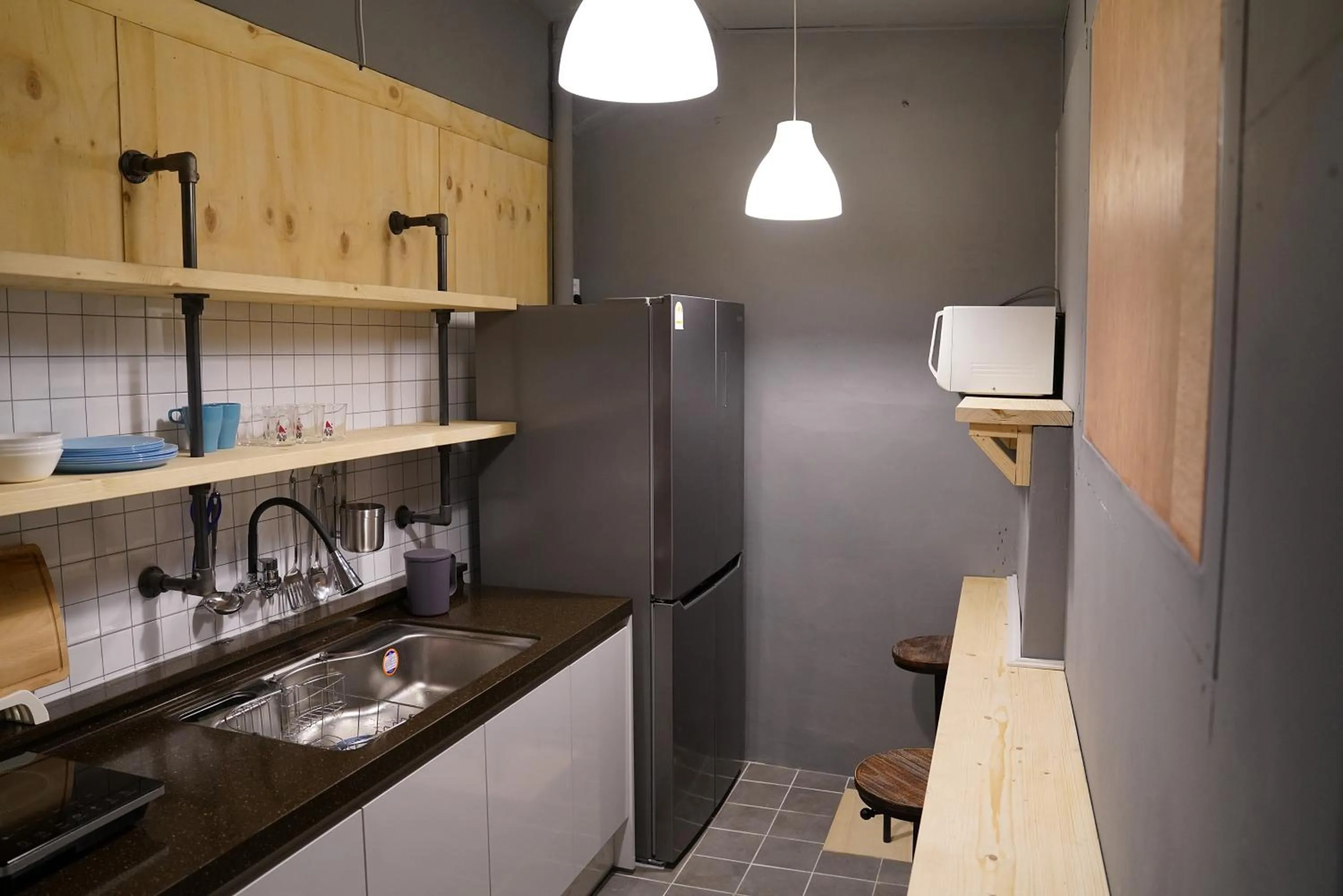 Communal kitchen in Apollo Guesthouse