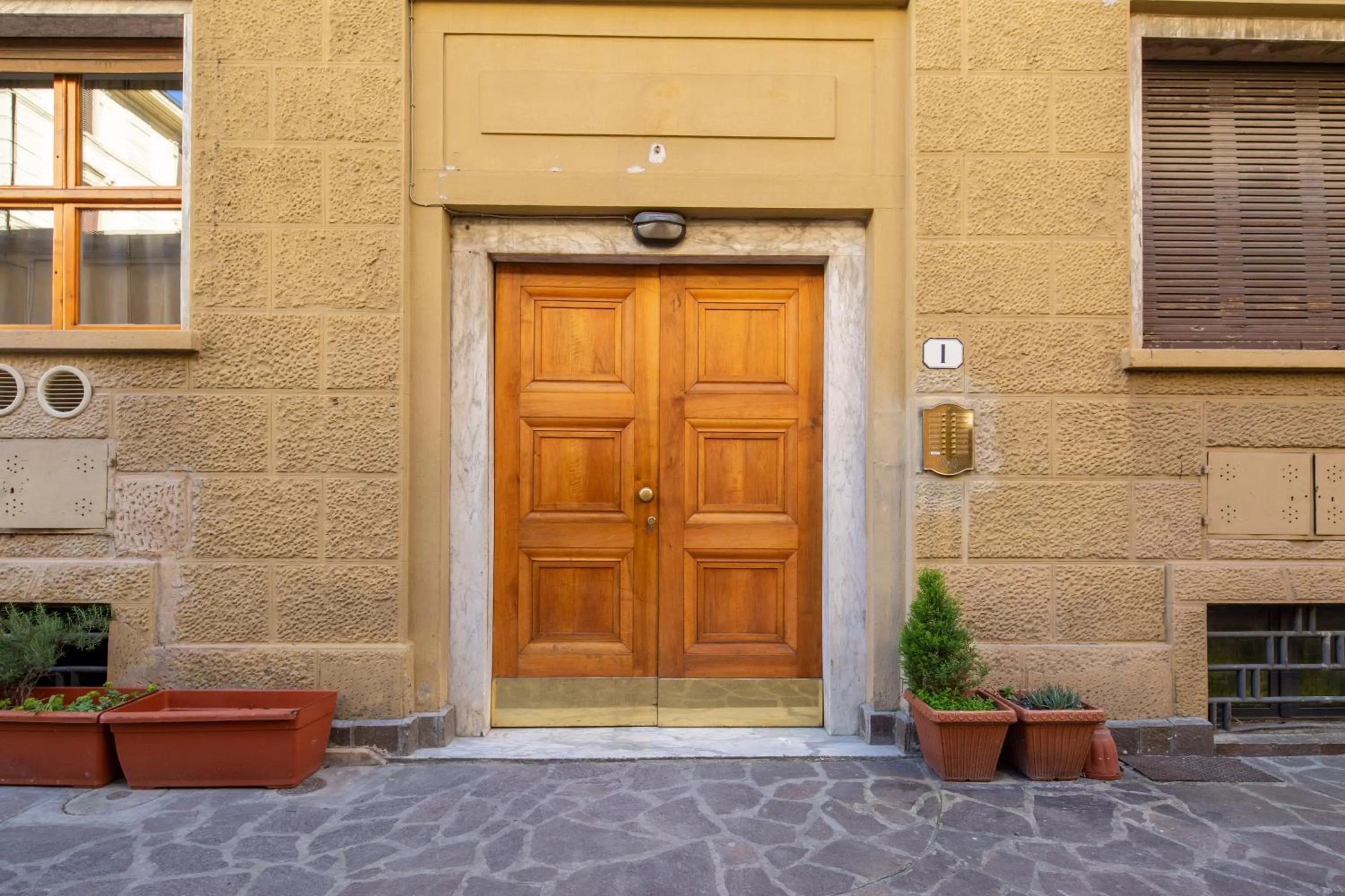 Facade/entrance in Central Station Apartment by Mmega