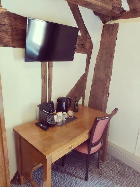 Bedroom in The Greyhound Inn