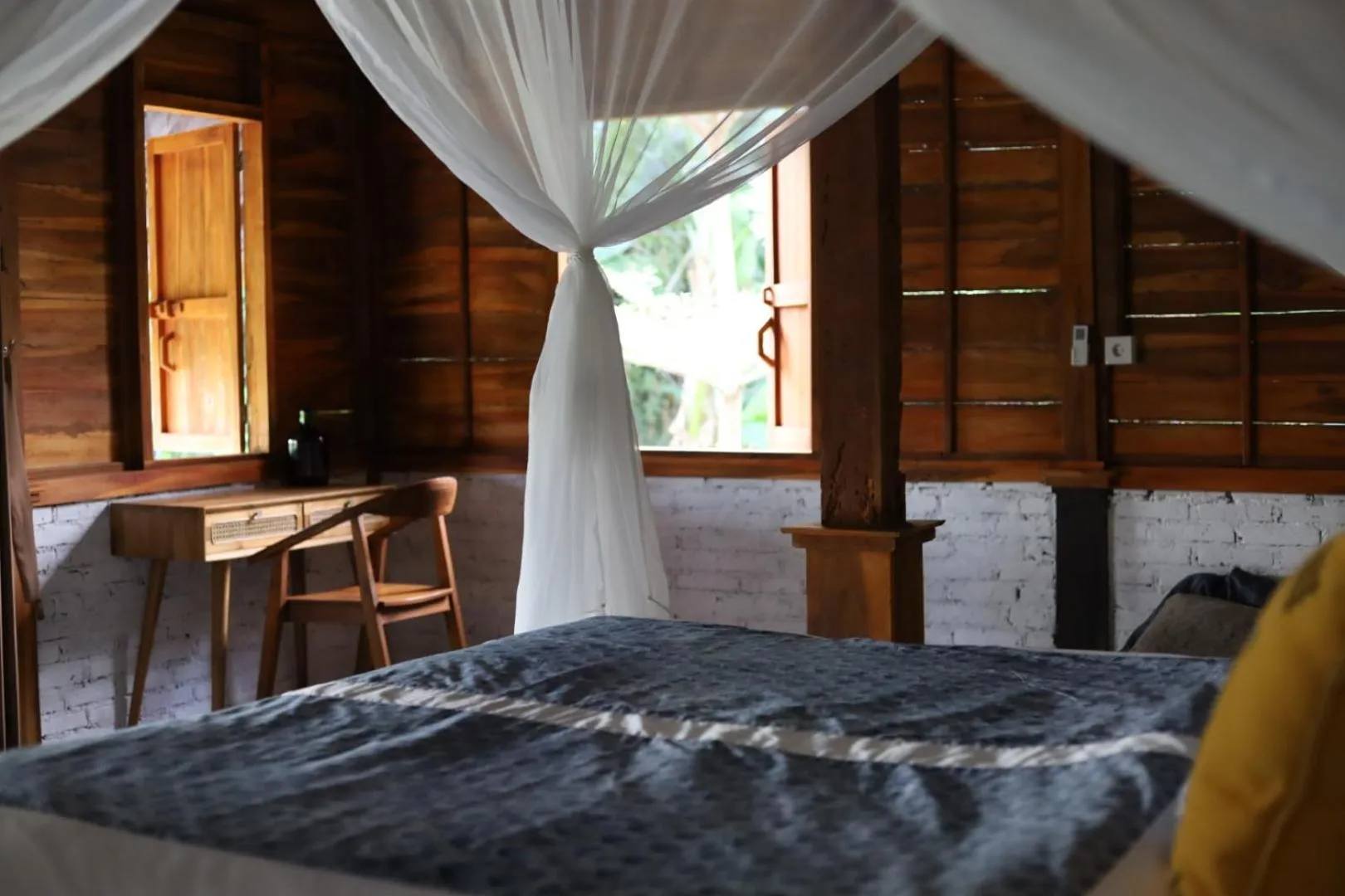 Bed in Ubuntu Bali Eco Yoga Retreat - CANGGU