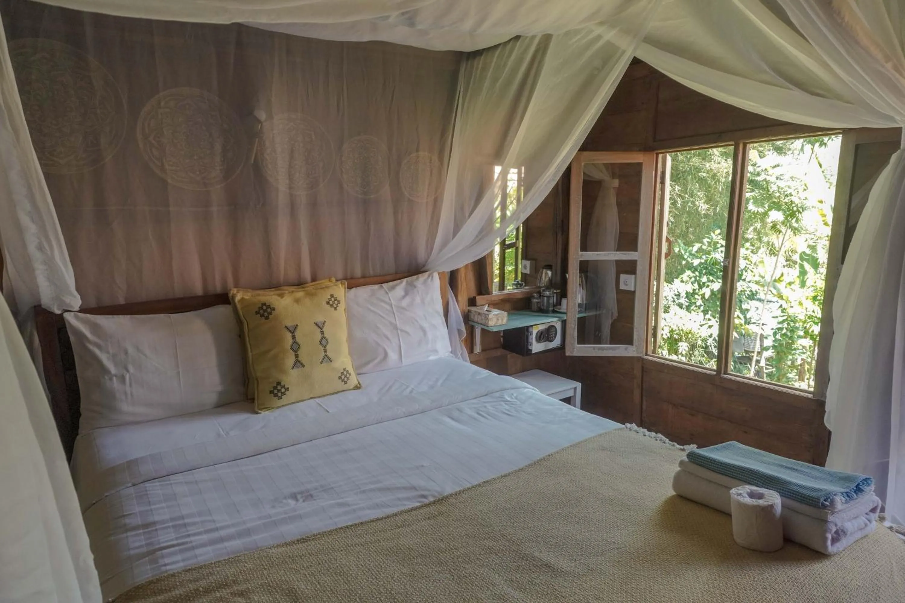 Bed in Ubuntu Bali Eco Yoga Retreat - CANGGU