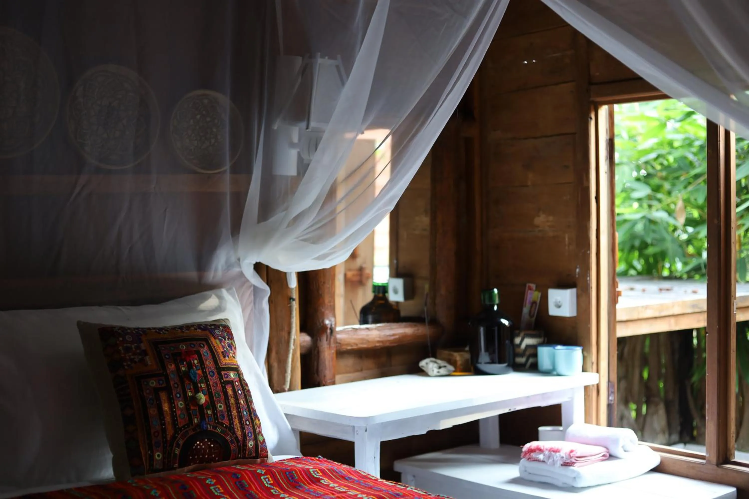 Bed in Ubuntu Bali Eco Yoga Retreat - CANGGU