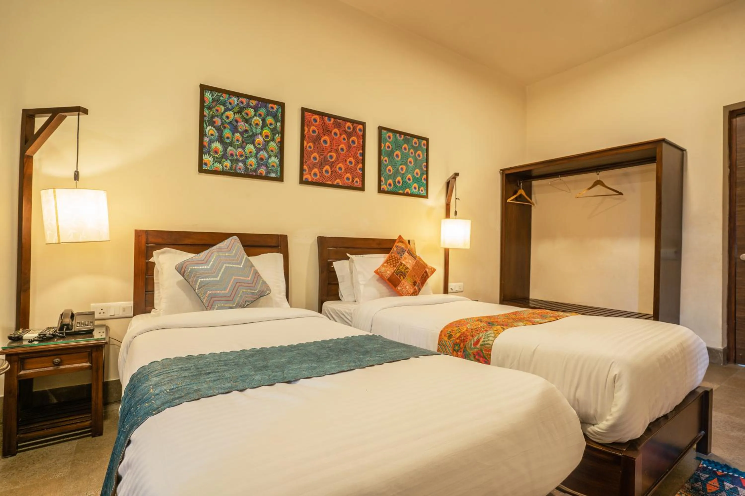 Bed in Tripli Hotels Shambhu Villas